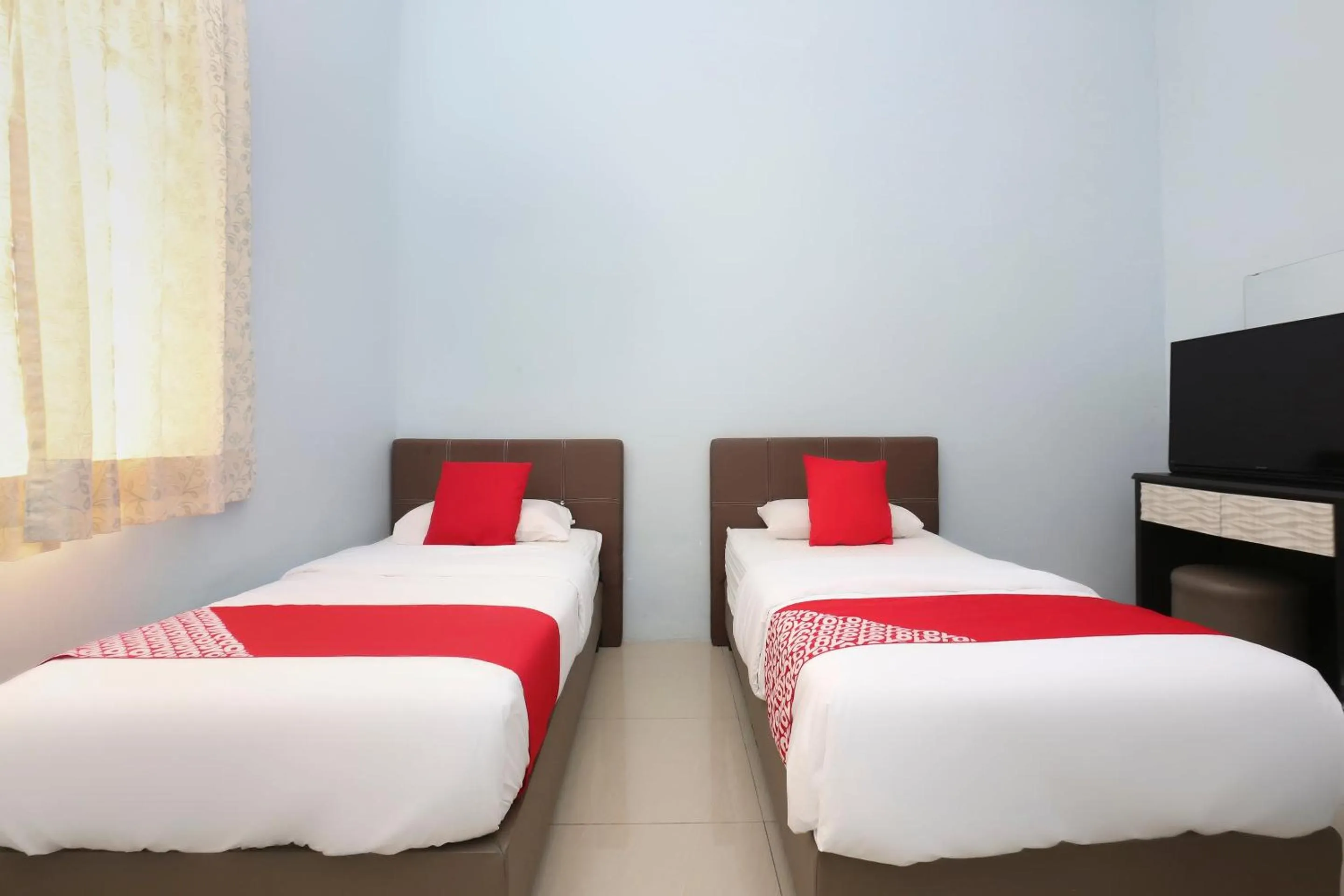 Bedroom, Bed in Hotel O Come Inn Premium