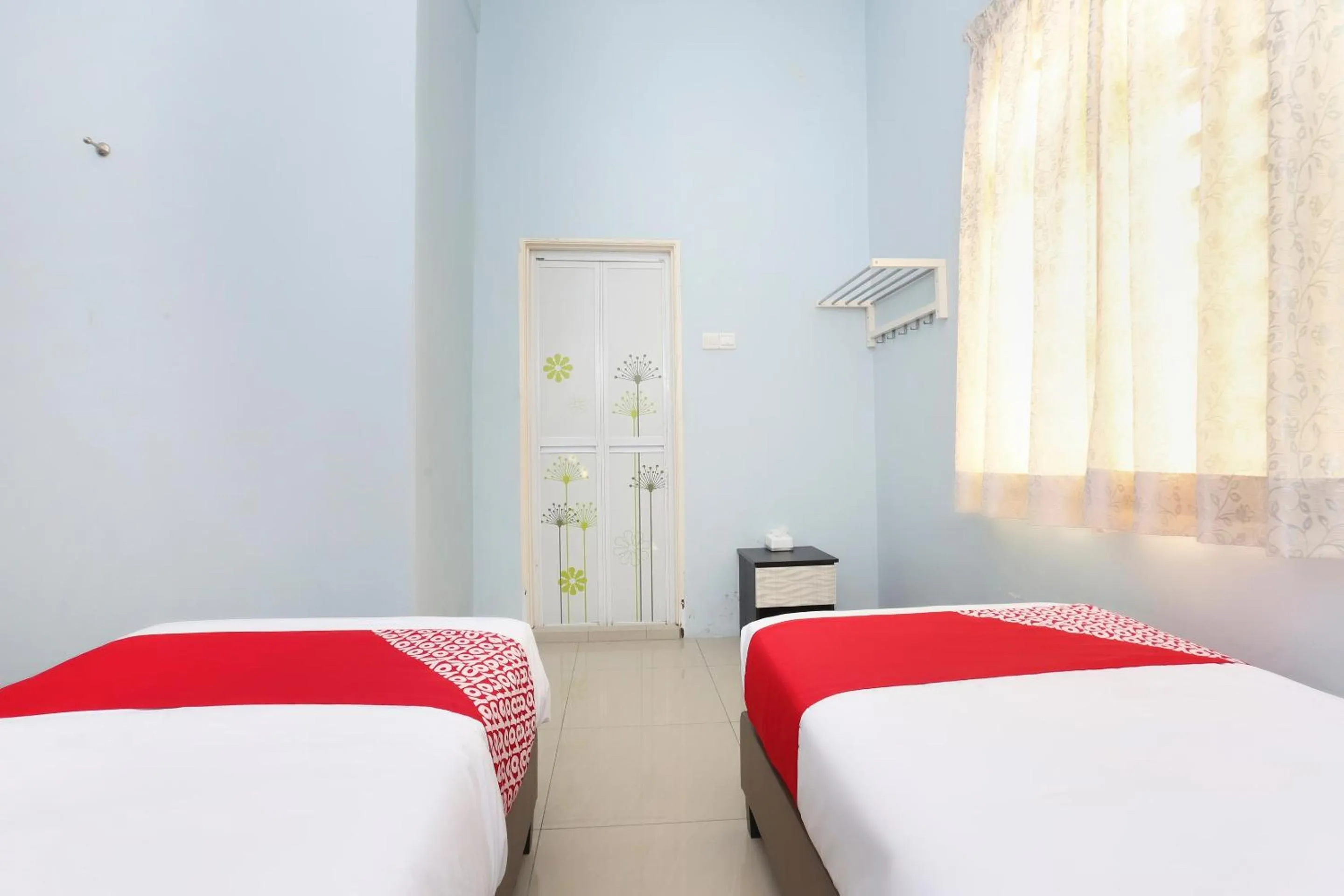 Bedroom, Bed in Hotel O Come Inn Premium