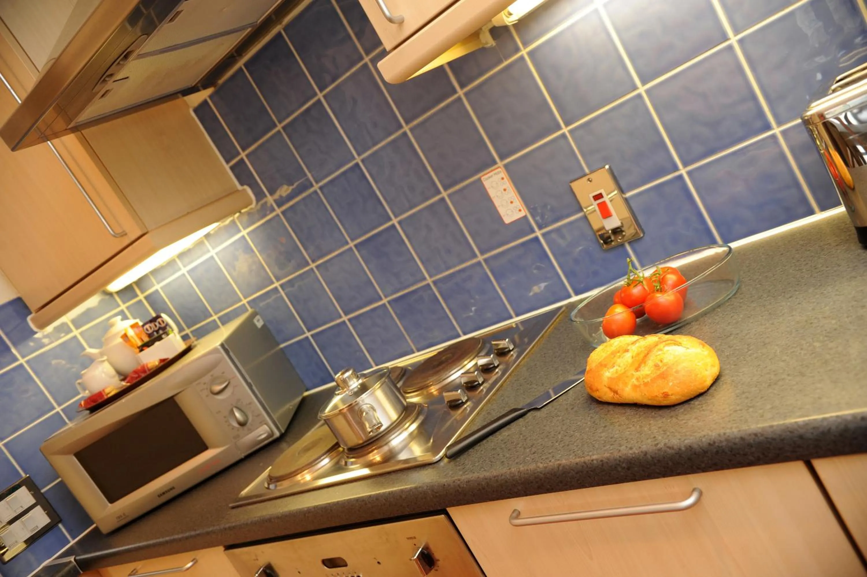 Kitchen or kitchenette in PREMIER SUITES Bristol Redcliffe