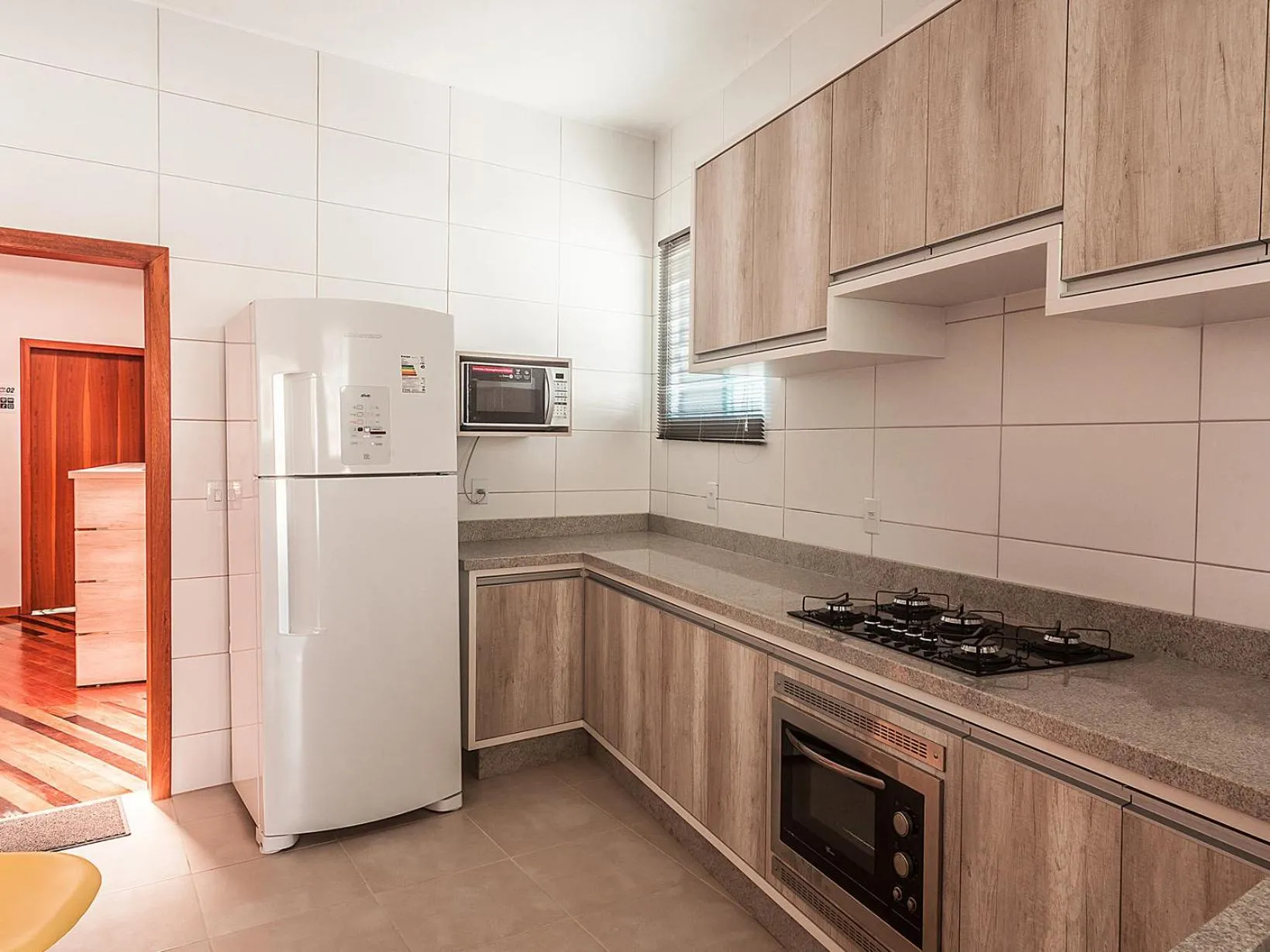 Communal kitchen in The Bridge Hostel Florianópolis