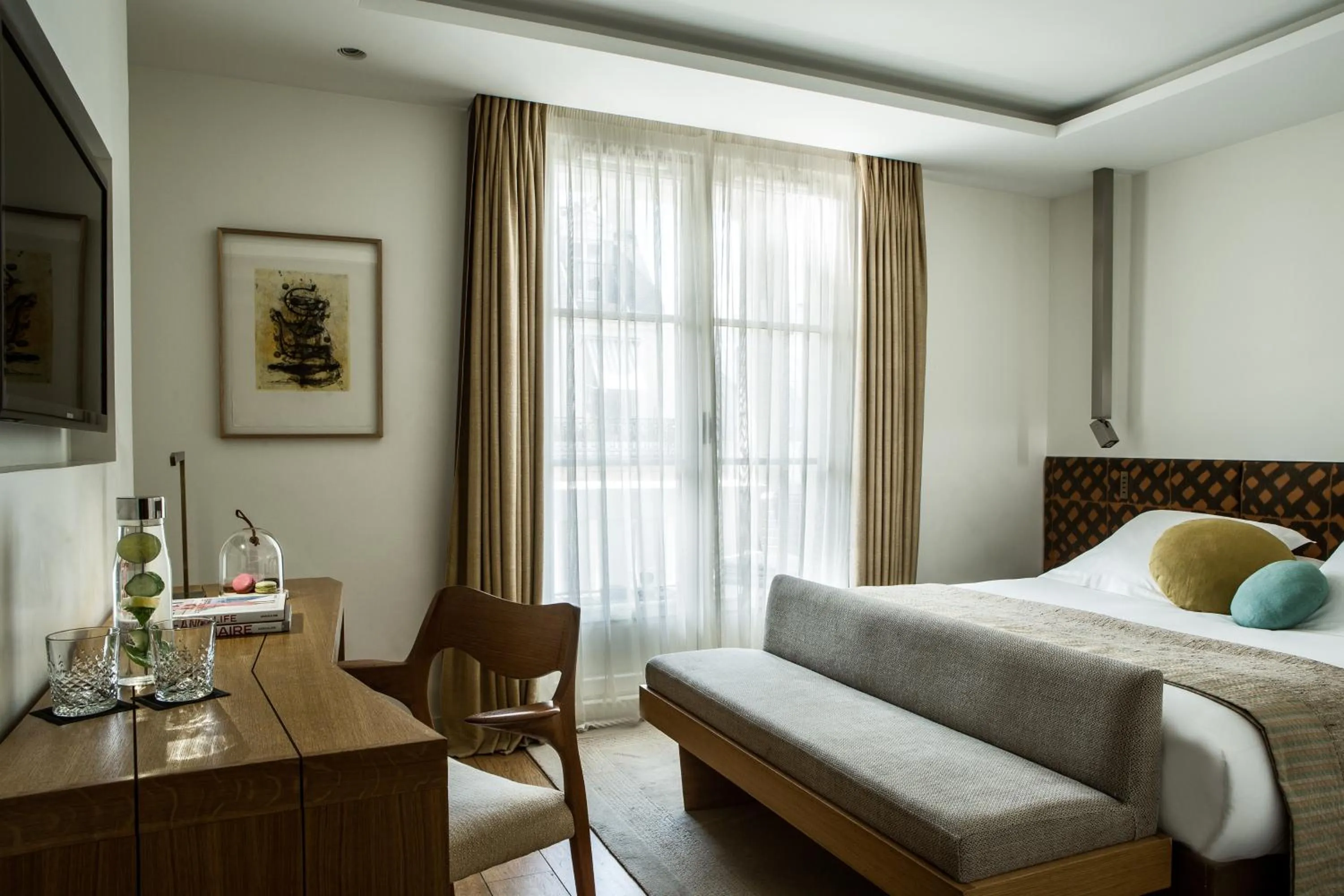 Bed in Hotel Marignan Champs-Elysées