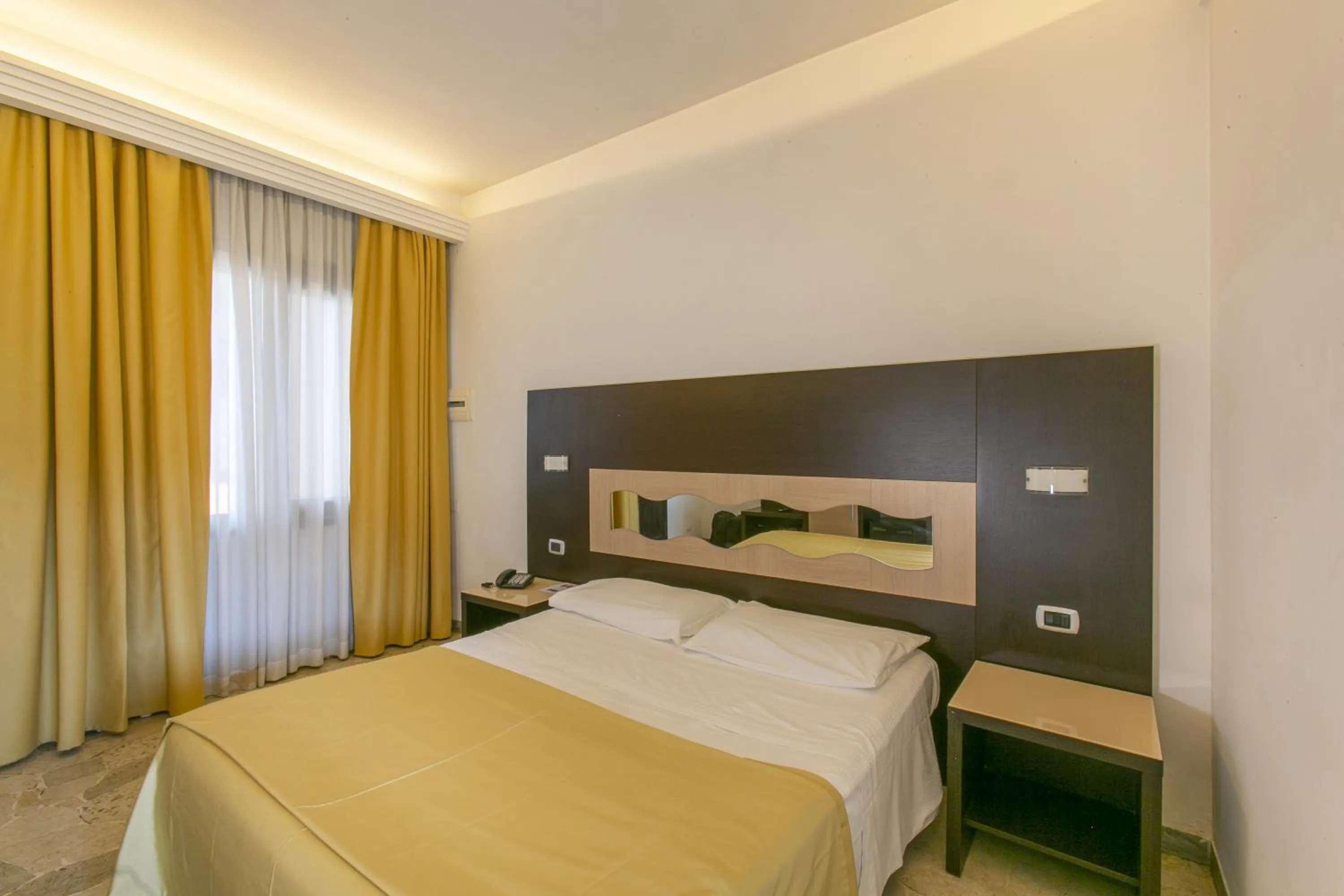 Bed in Hotel Boomerang