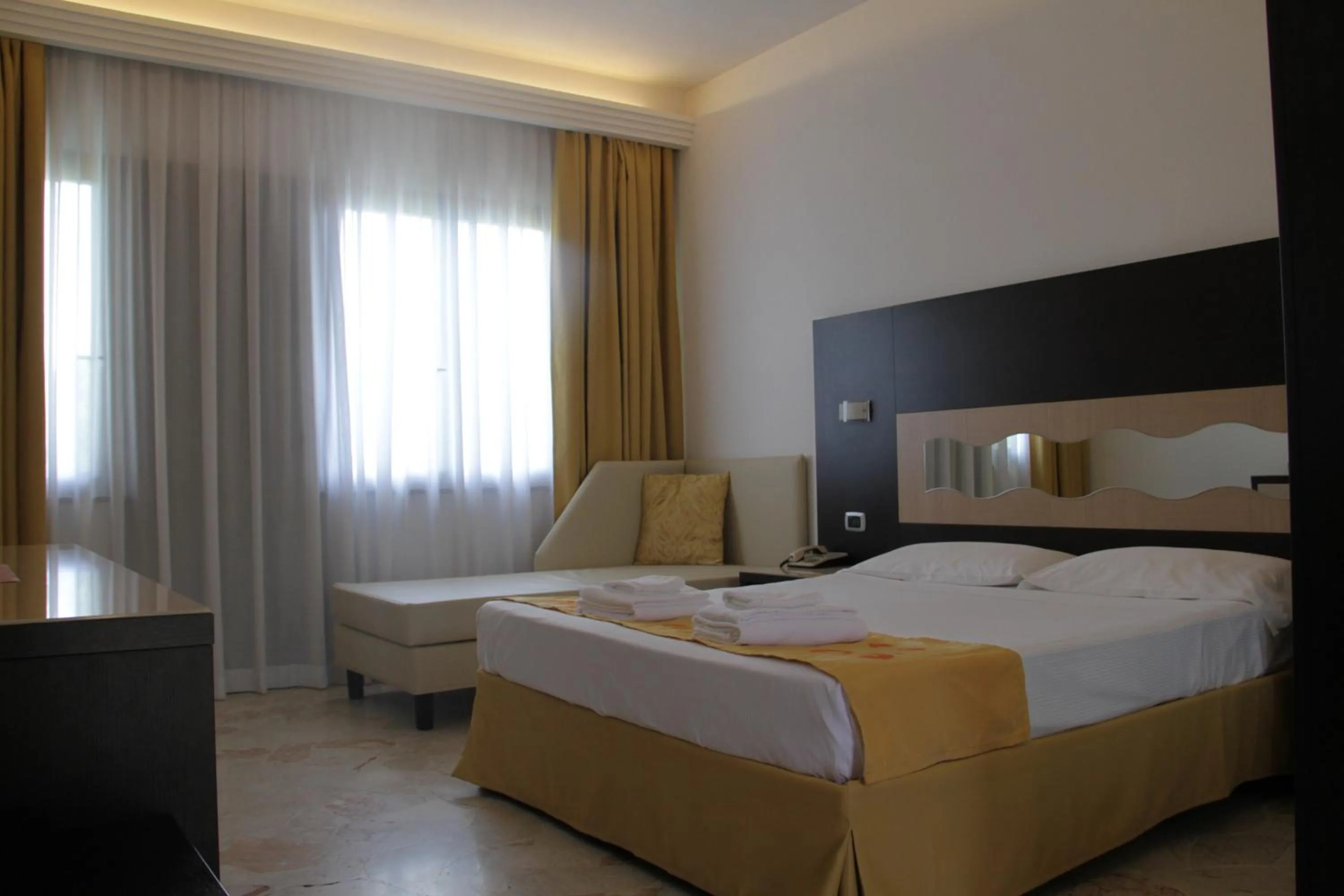 Bed in Hotel Boomerang