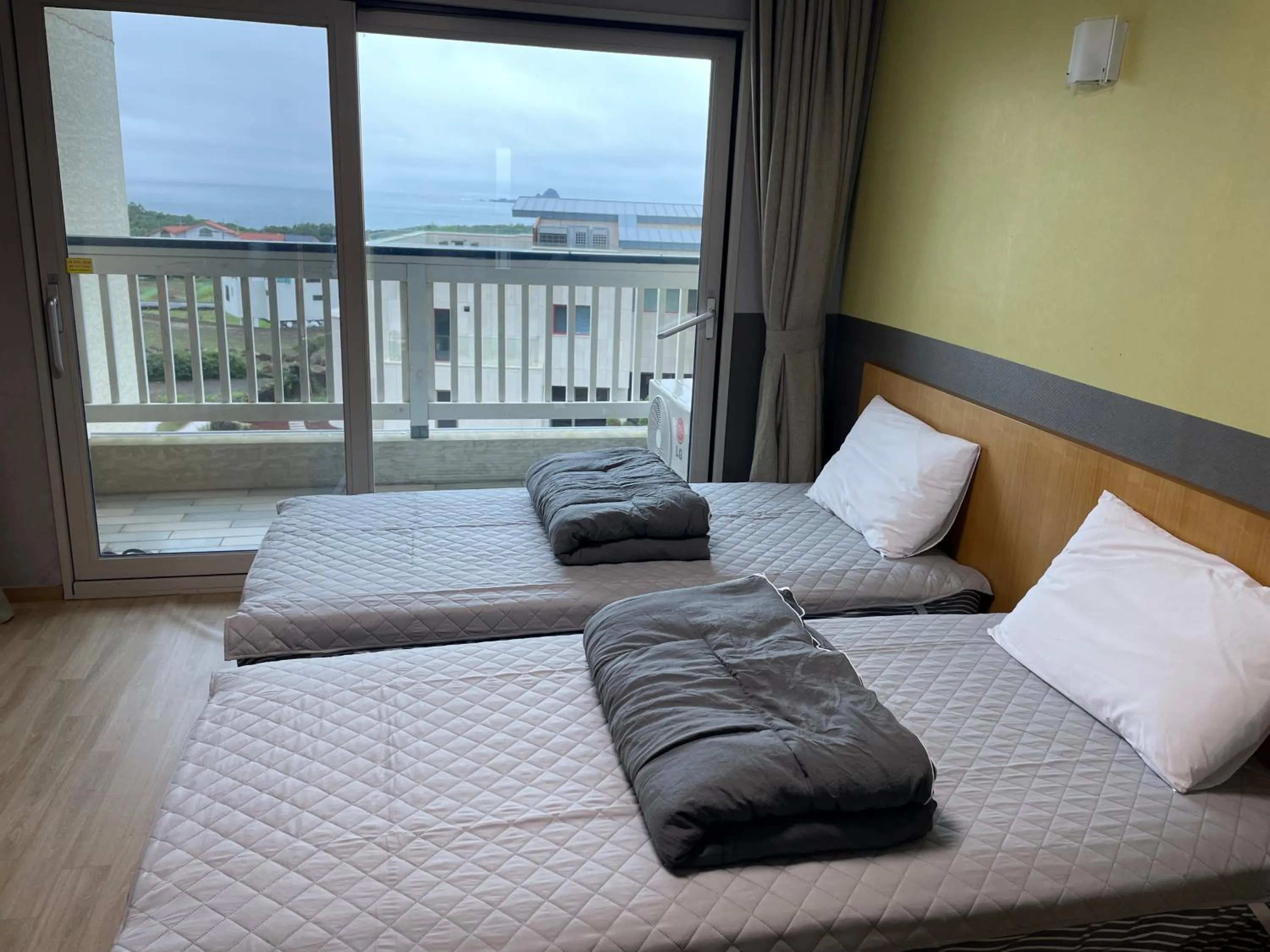 Bed in Jeju the Ocean Hill Pension