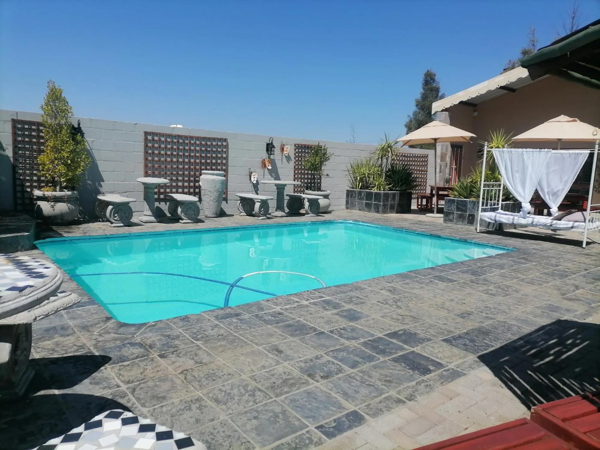 Pool view in Daisy Country Lodge