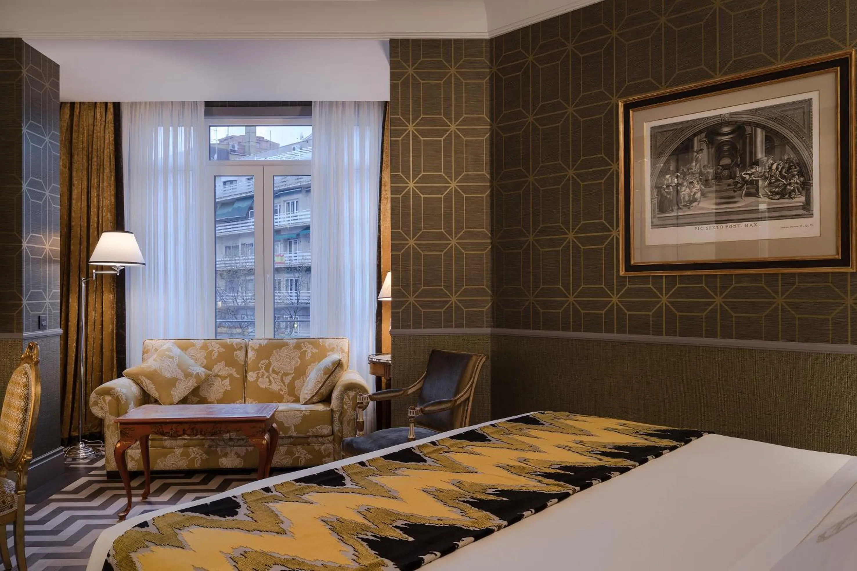 Seating area, Bed in Relais & Châteaux Heritage Hotel