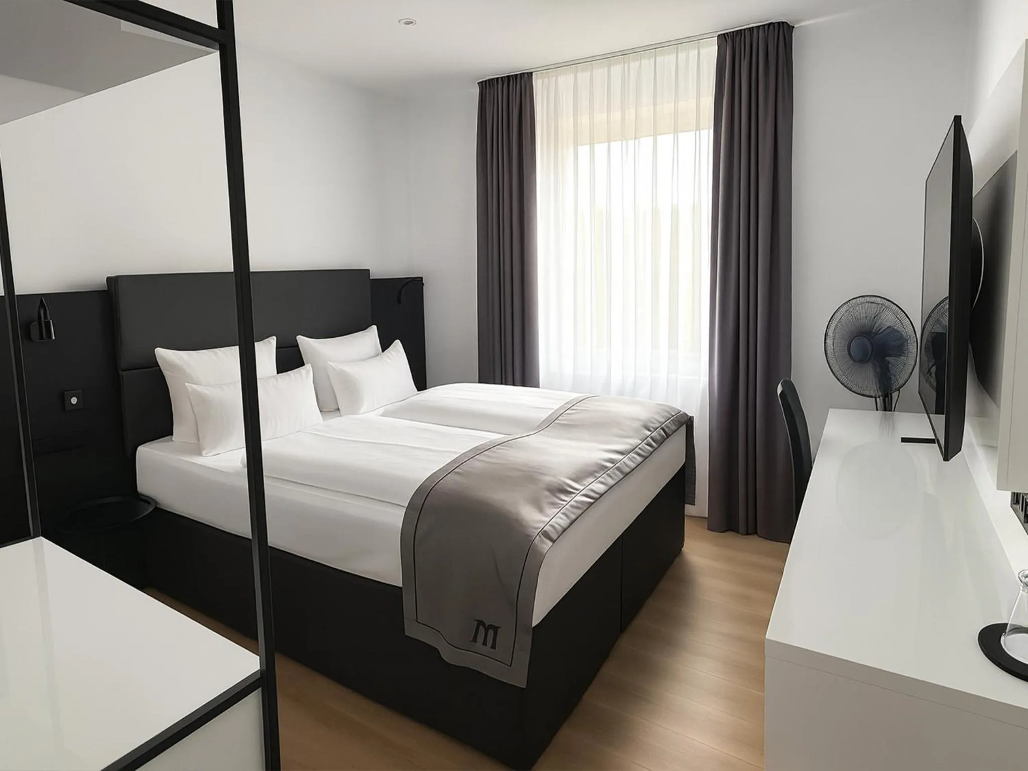 Photo of the whole room, Bed in DORMERO Hotel Wilhelmshaven