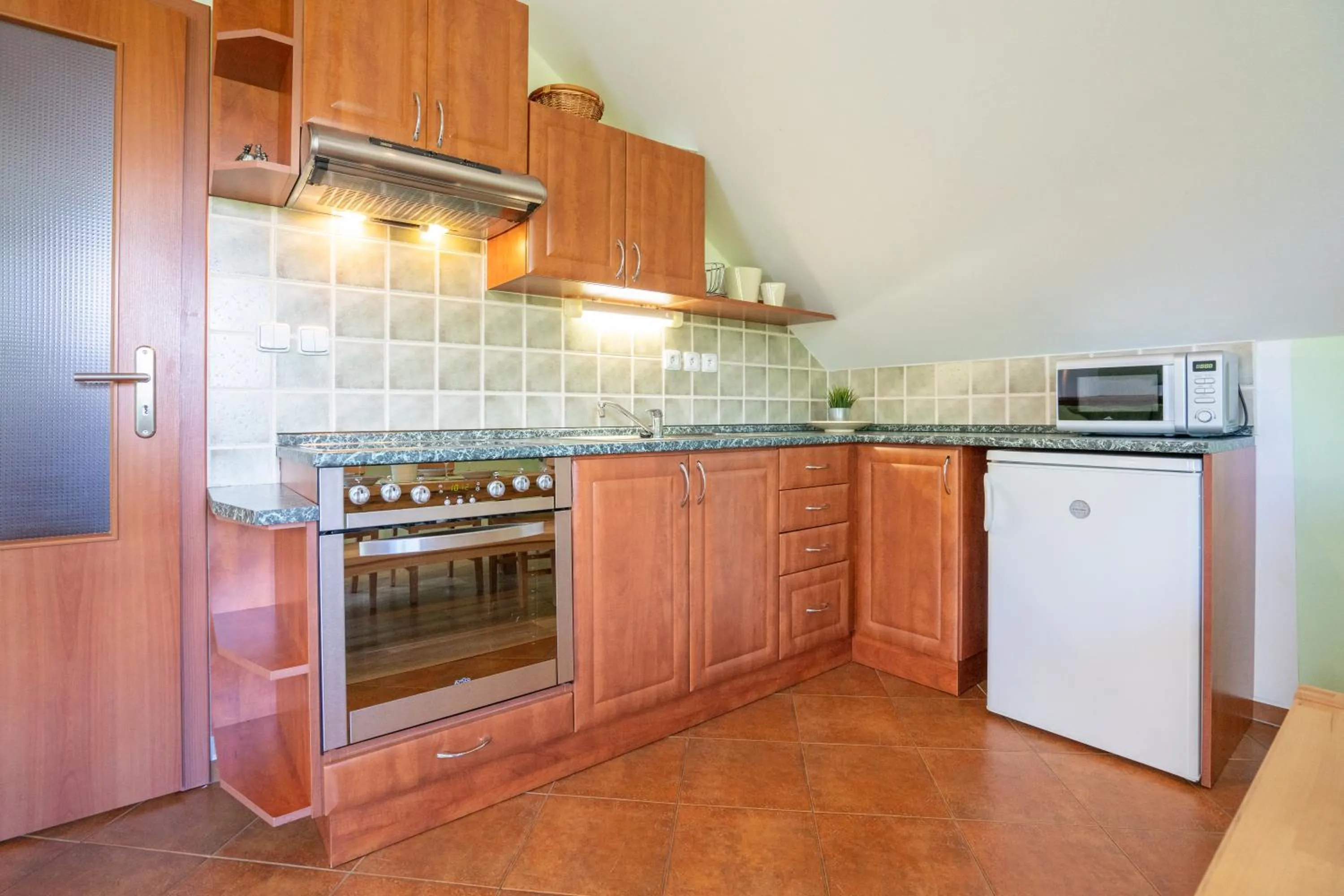 Kitchen or kitchenette in Apartmán Lípa-Lipno