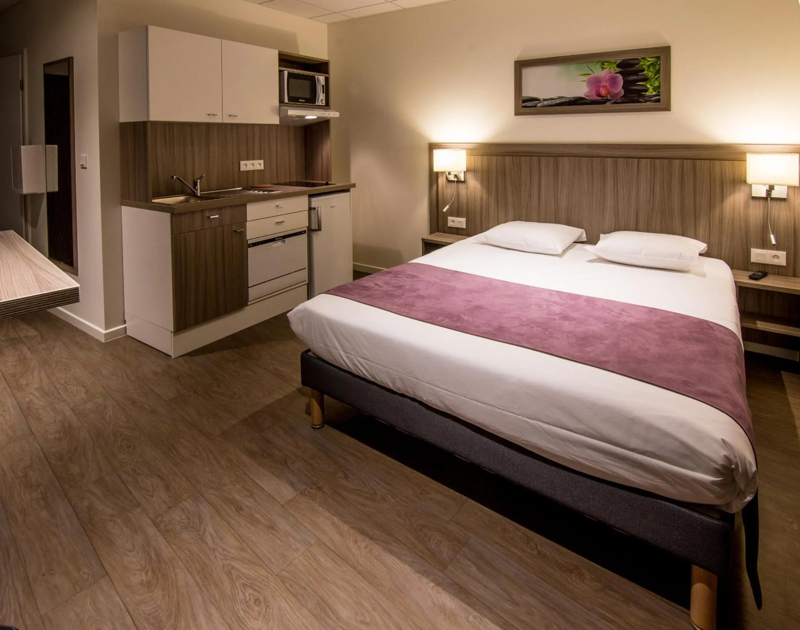 Bed in Tulip Inn Thionville Residences