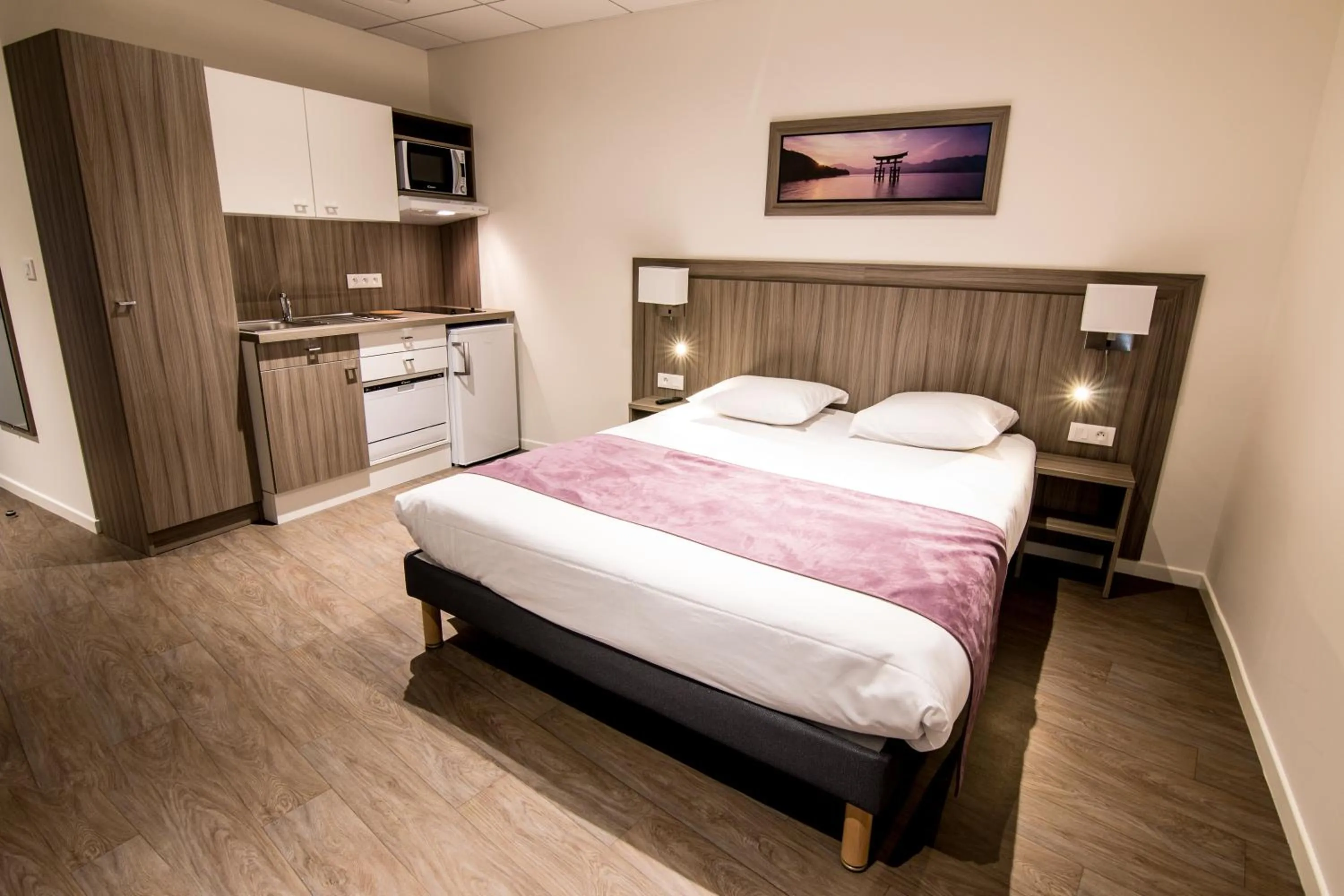 Bed in Tulip Inn Thionville Residences