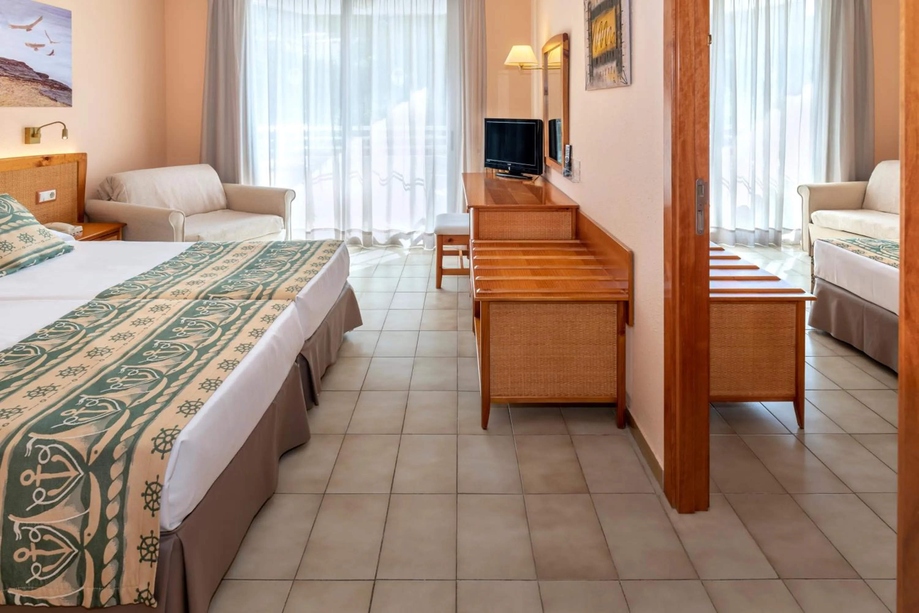 Photo of the whole room, Bed in GHT Oasis Tossa & Spa