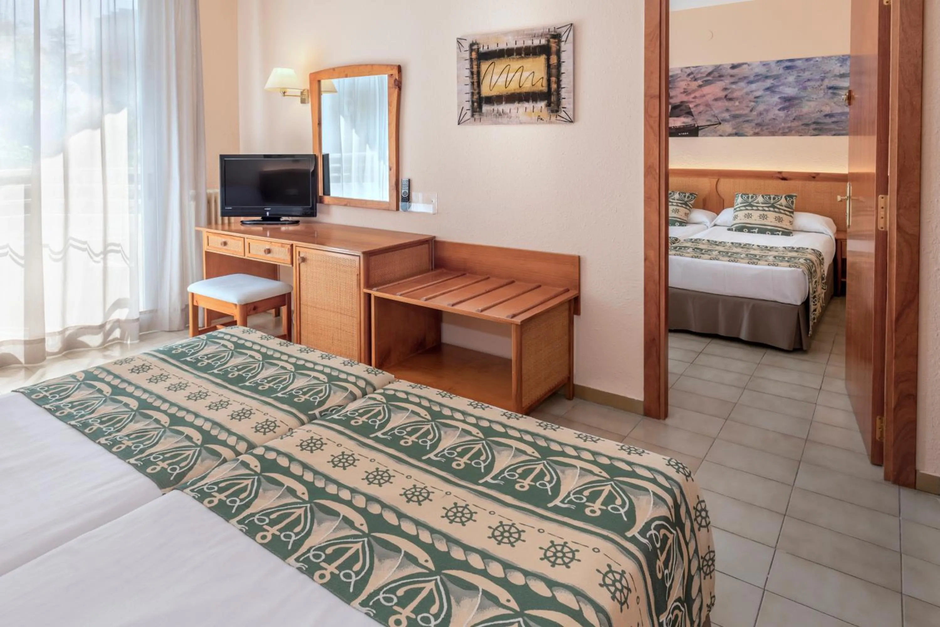 Photo of the whole room, Bed in GHT Oasis Tossa & Spa