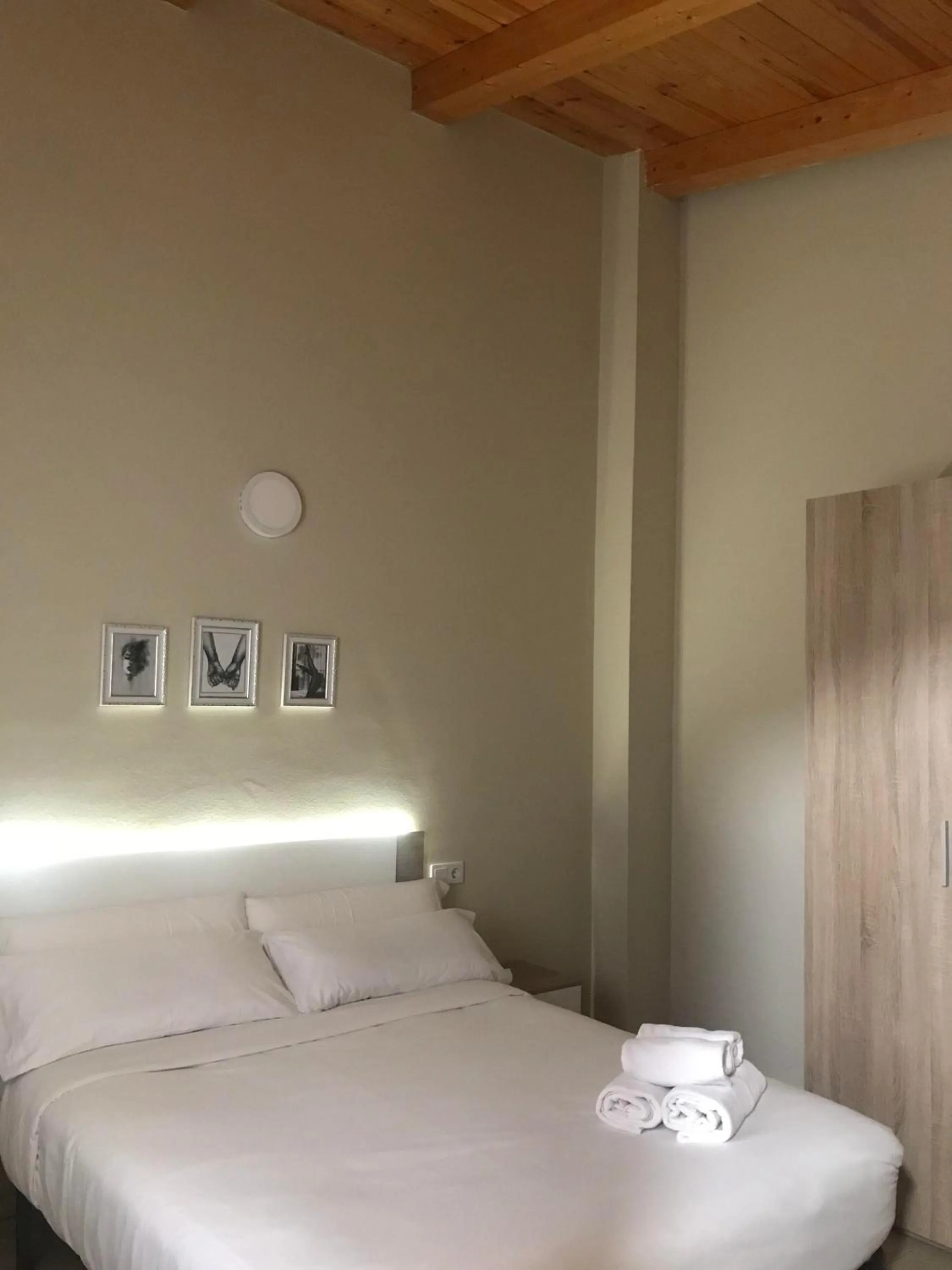 Bed in Apartamentos Giuliano