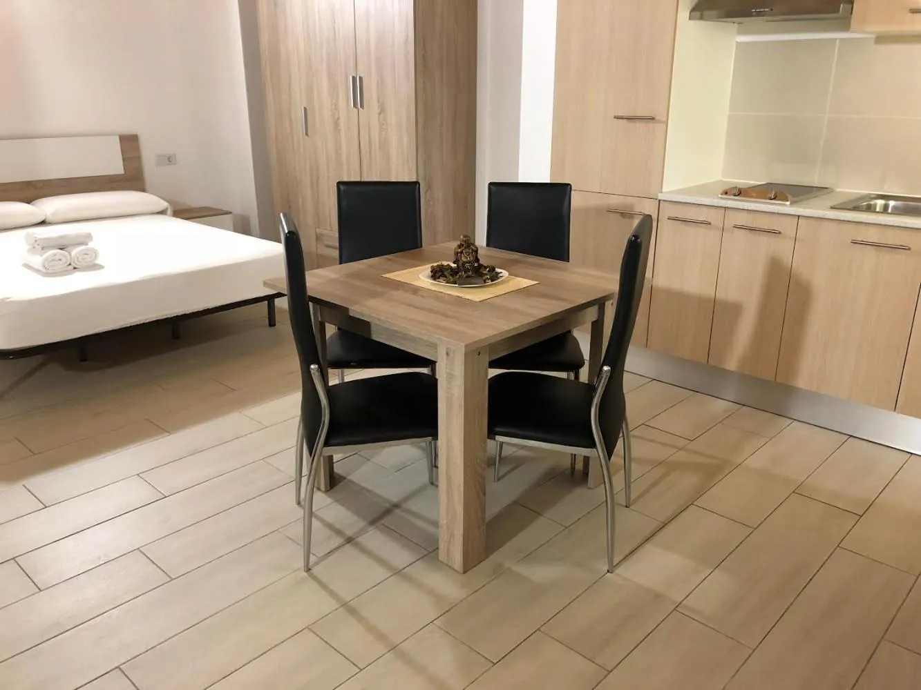 Dining area in Apartamentos Giuliano