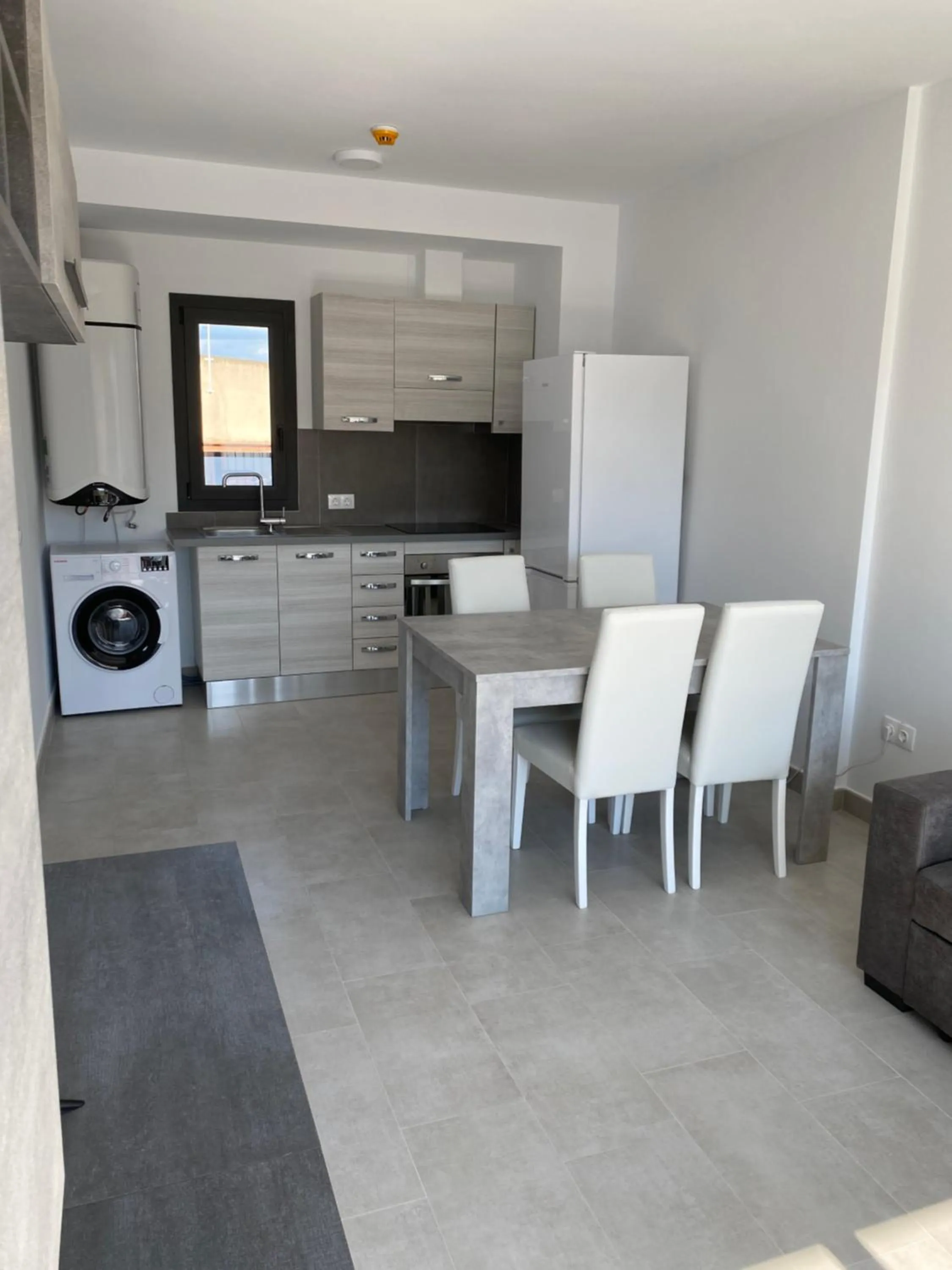 Kitchen or kitchenette in Apartamentos Giuliano