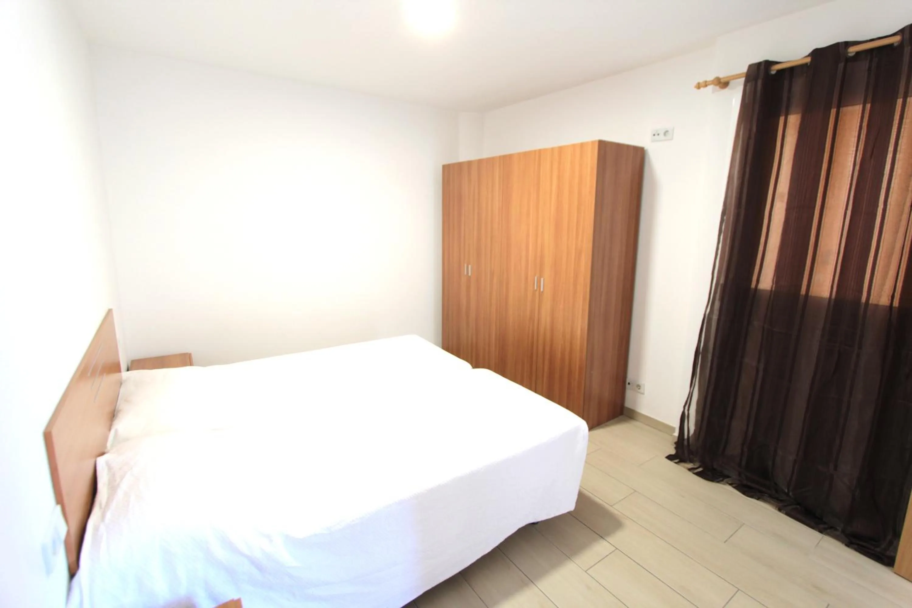 Bed in Apartamentos Giuliano