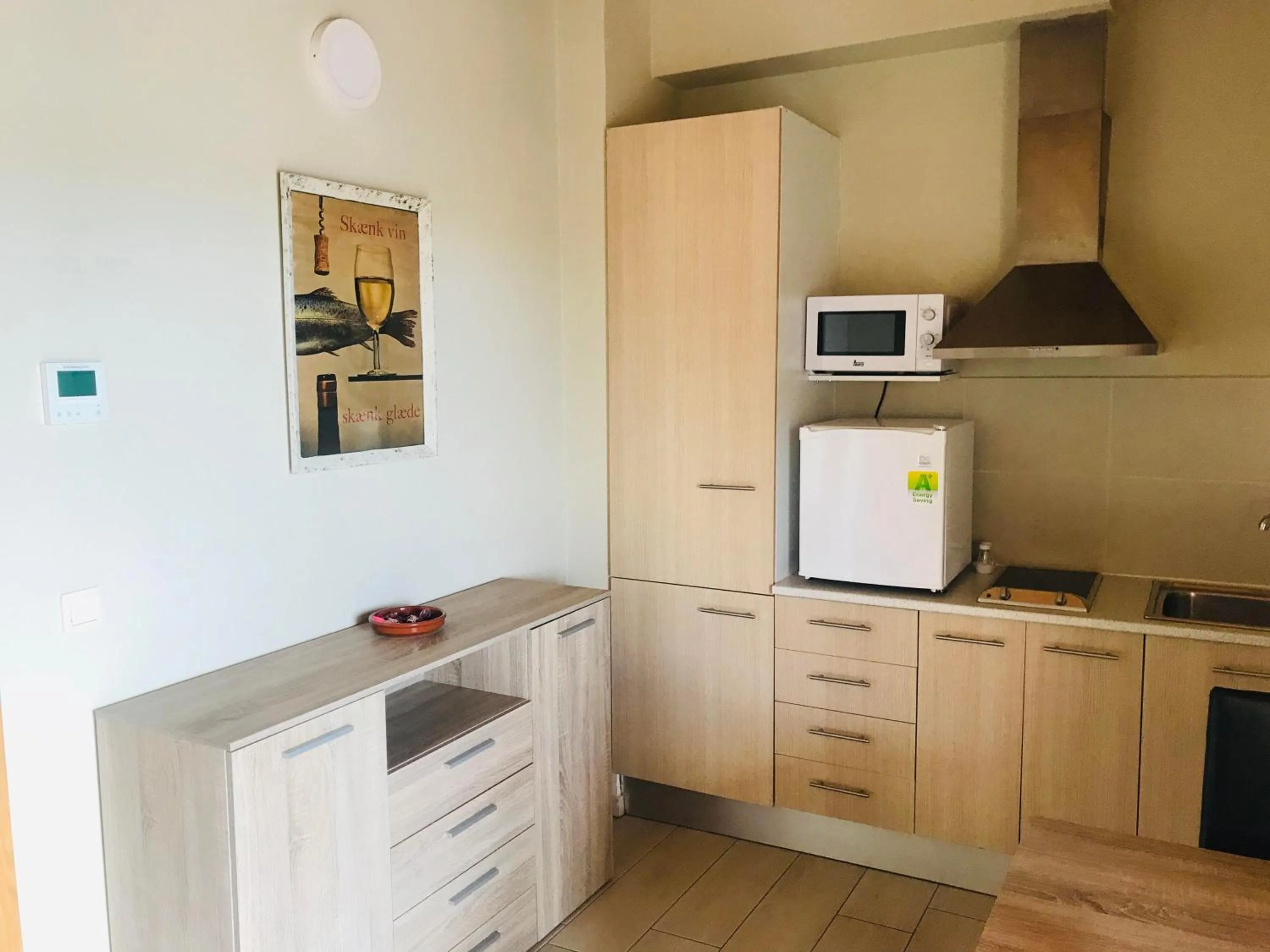 Kitchen or kitchenette in Apartamentos Giuliano