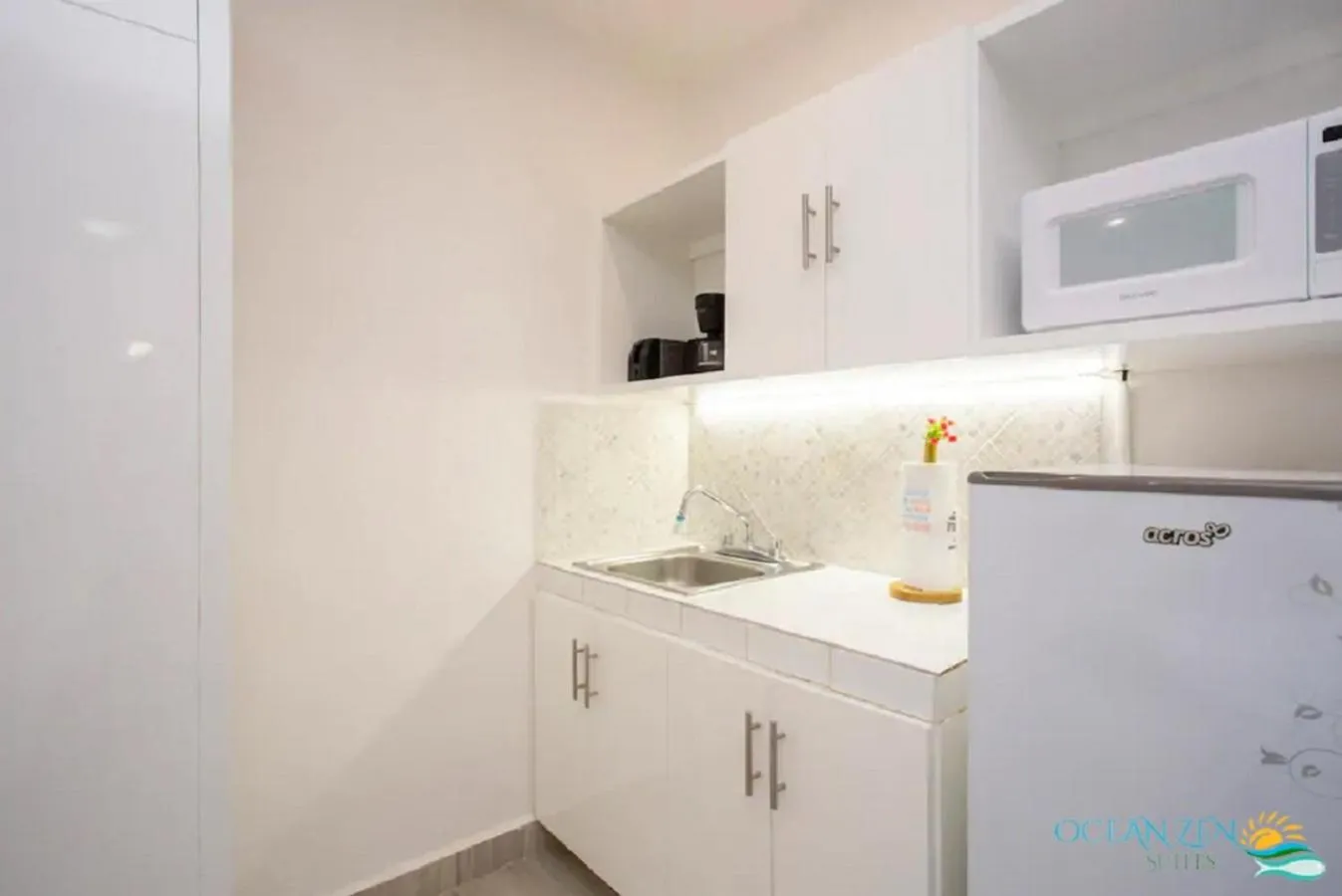 Kitchen or kitchenette in Ocean Zen Suites on 5th Avenue - Adults Only