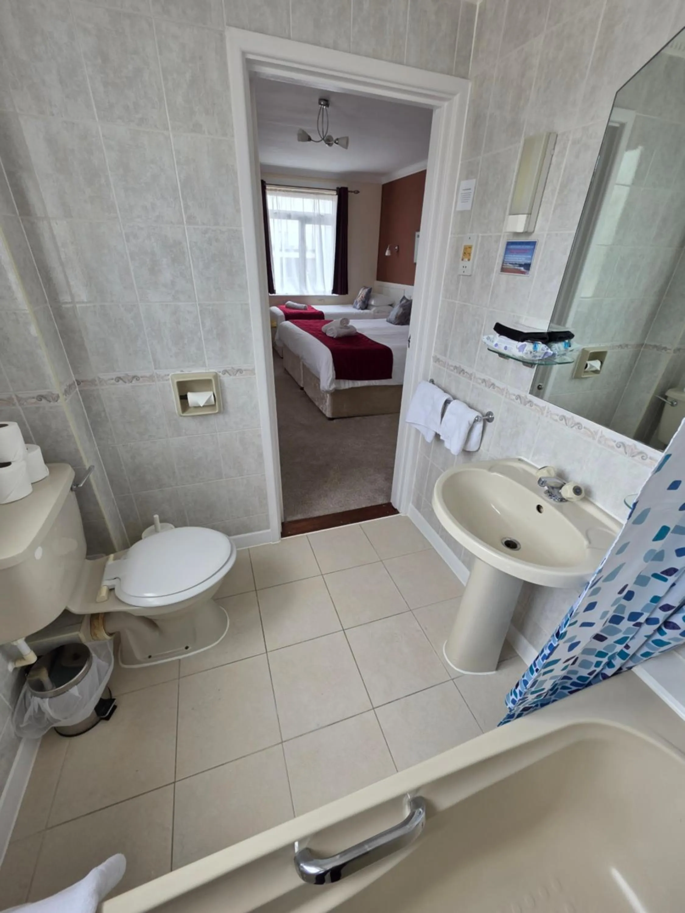 Bathroom in Marina Metro Hotel