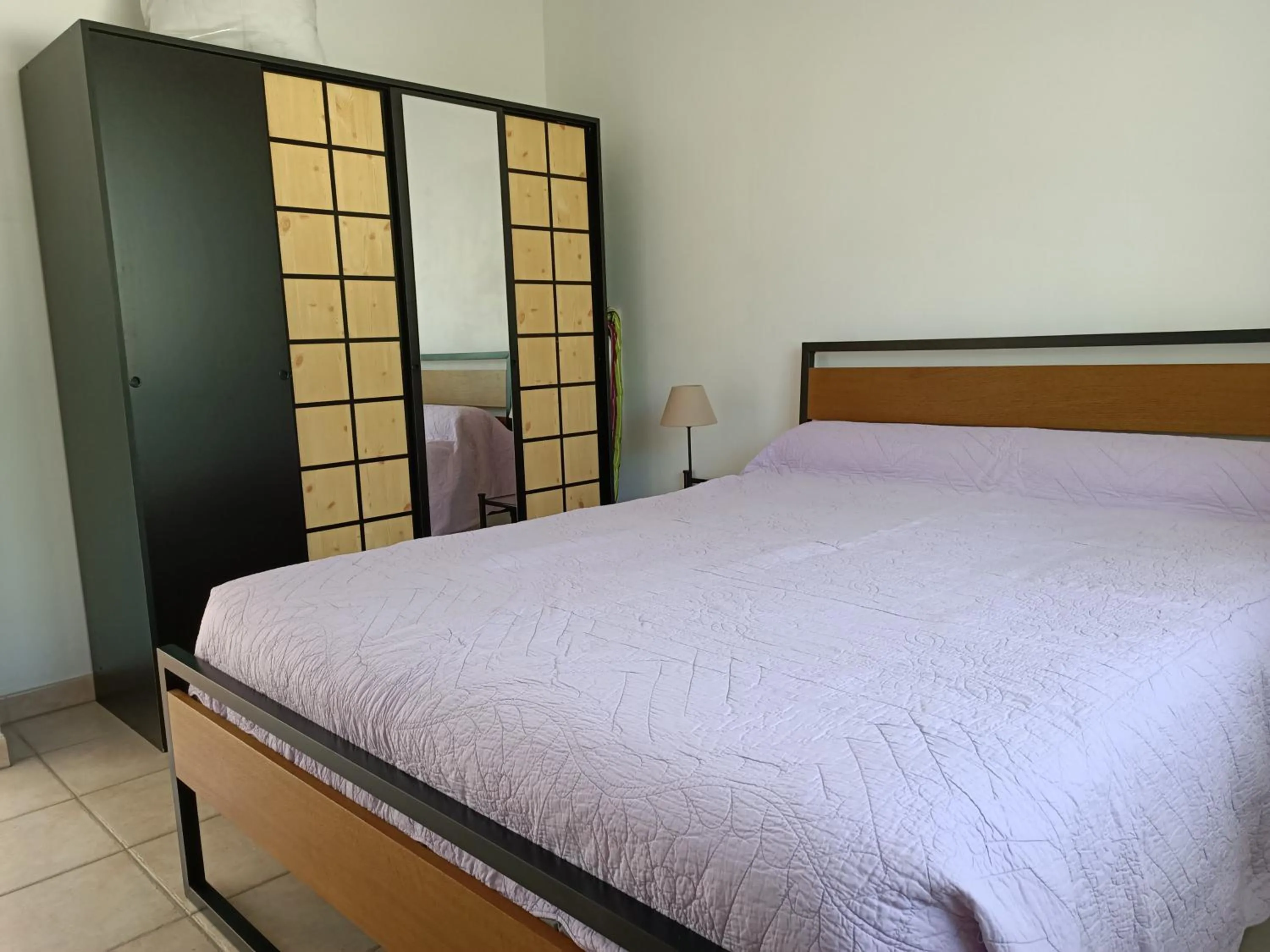 Bed in Appartement Gerezitenia