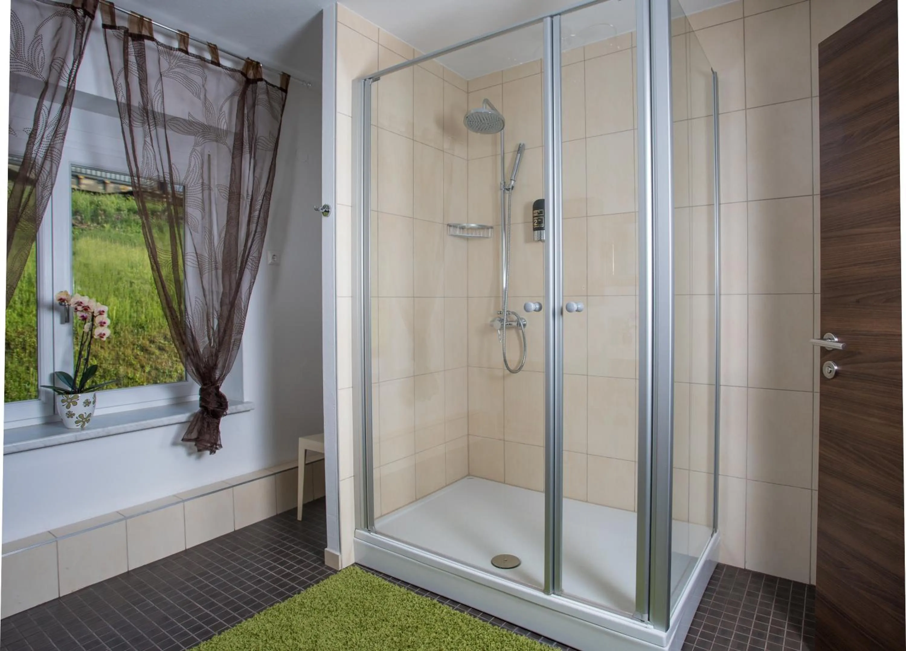 Shower in Hotel Faaker See Inn by S4Y