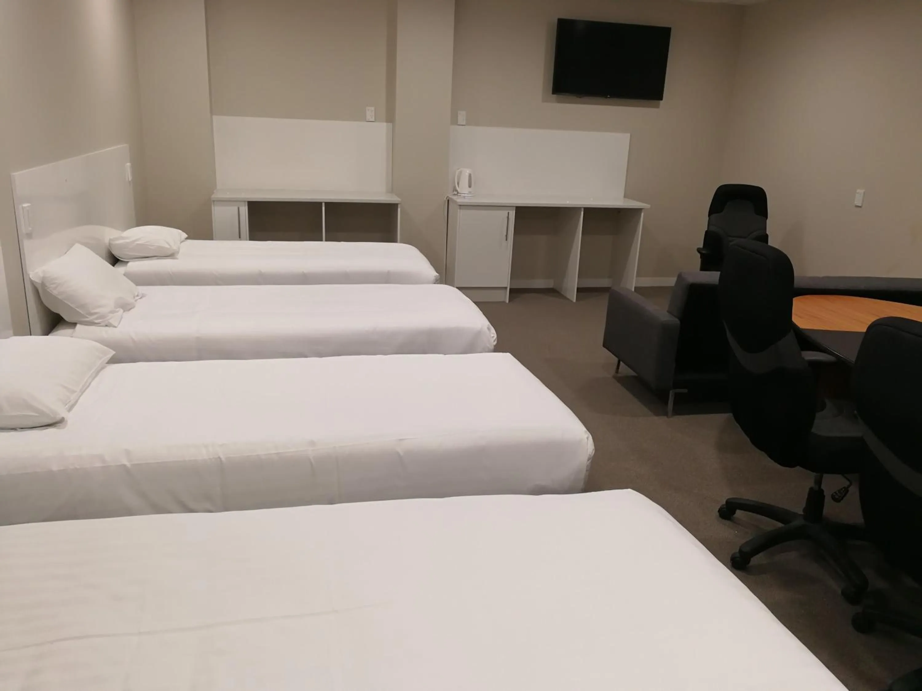 Bed in Three Palms Lodge