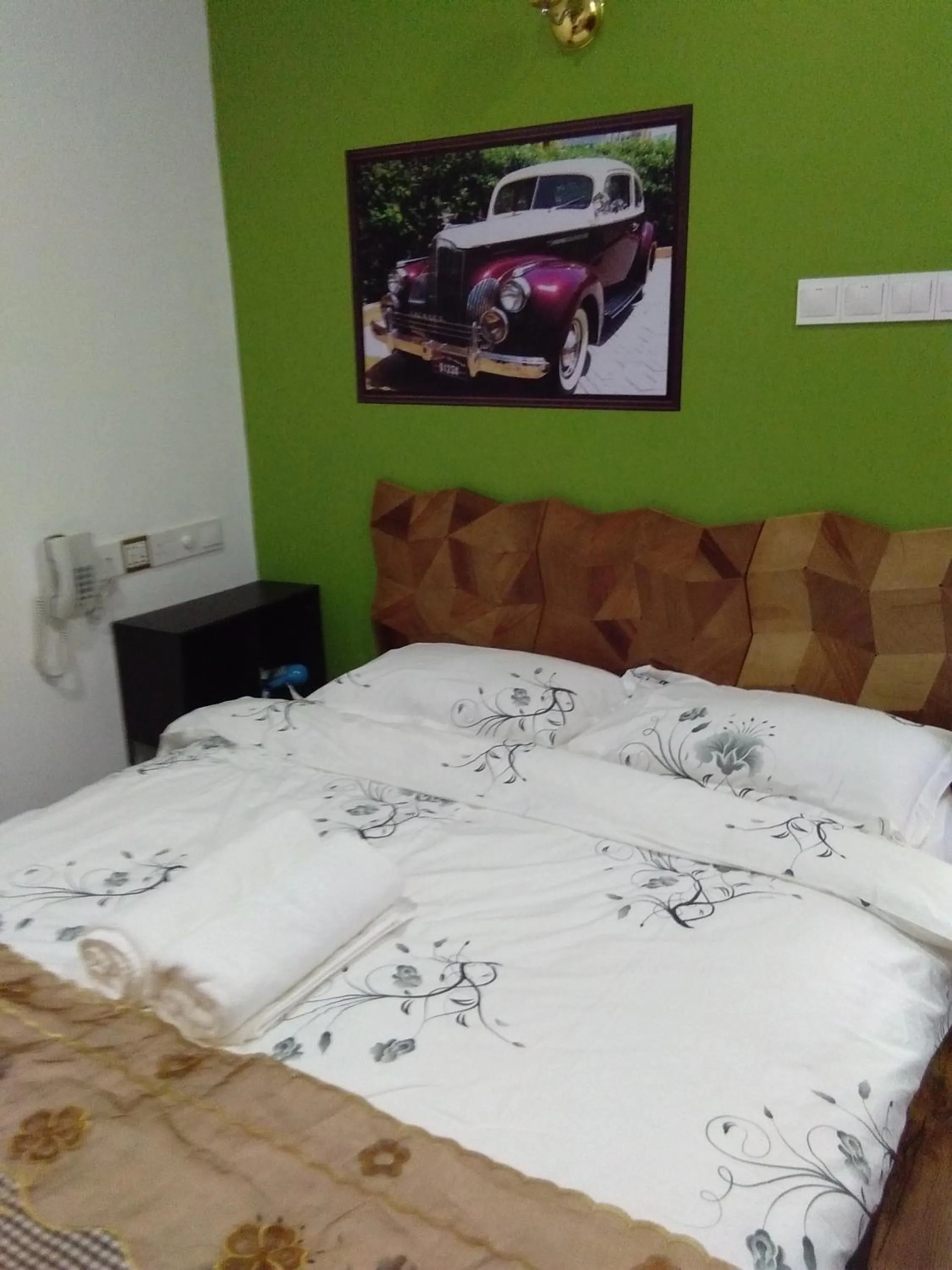 Bedroom in PI Grand Hotel