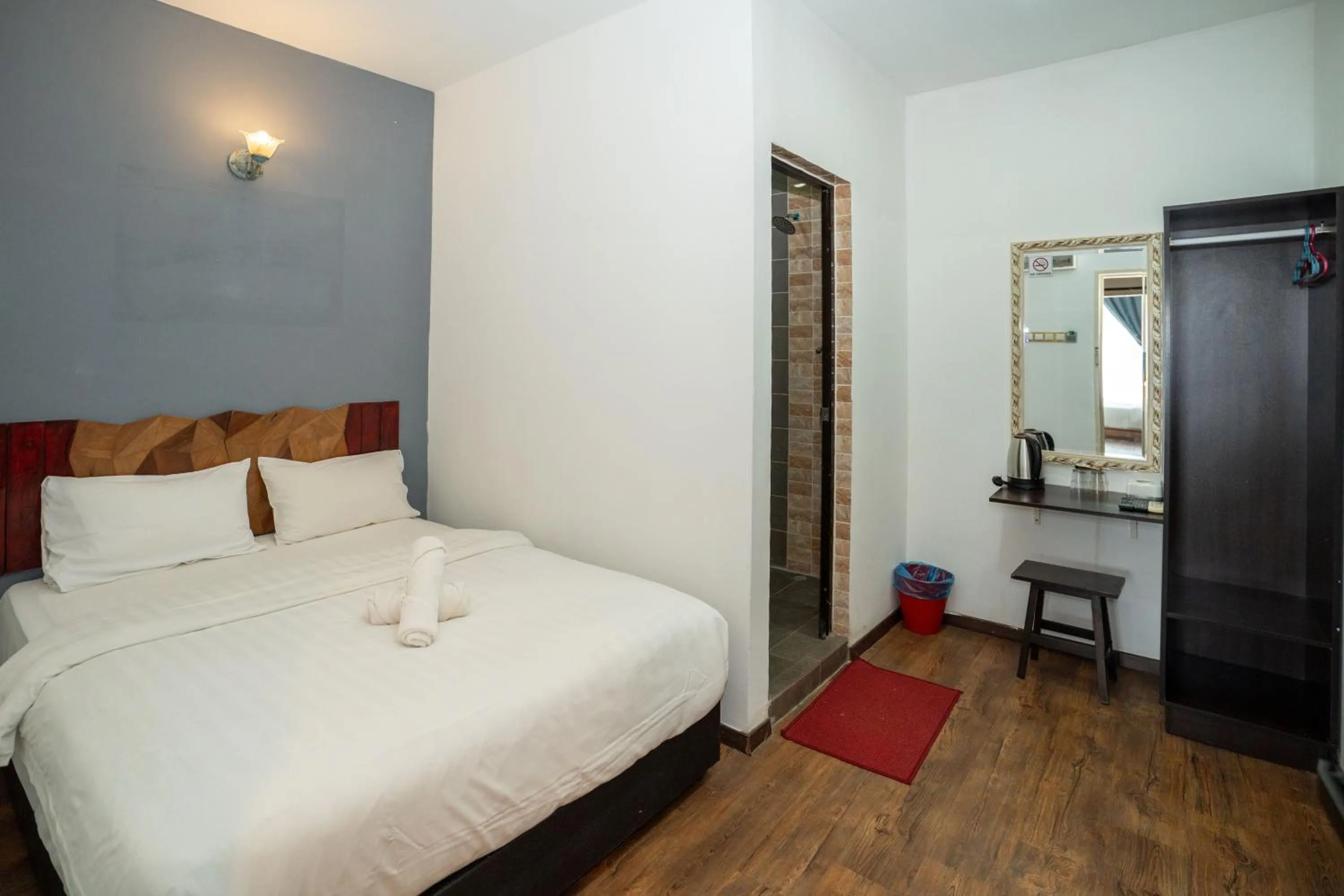 Bed in De Grand Boutique Hotel