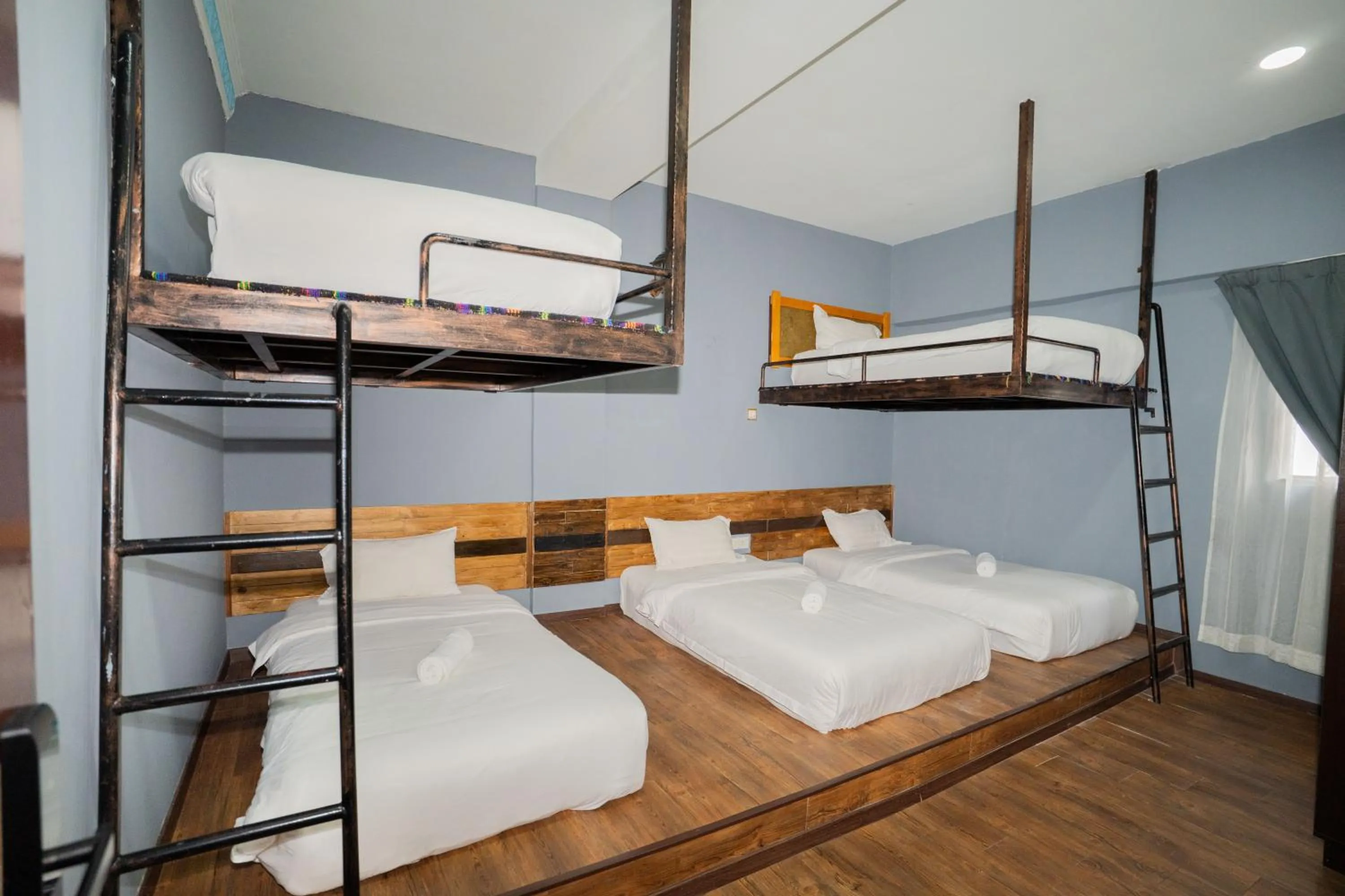 Bed in De Grand Boutique Hotel