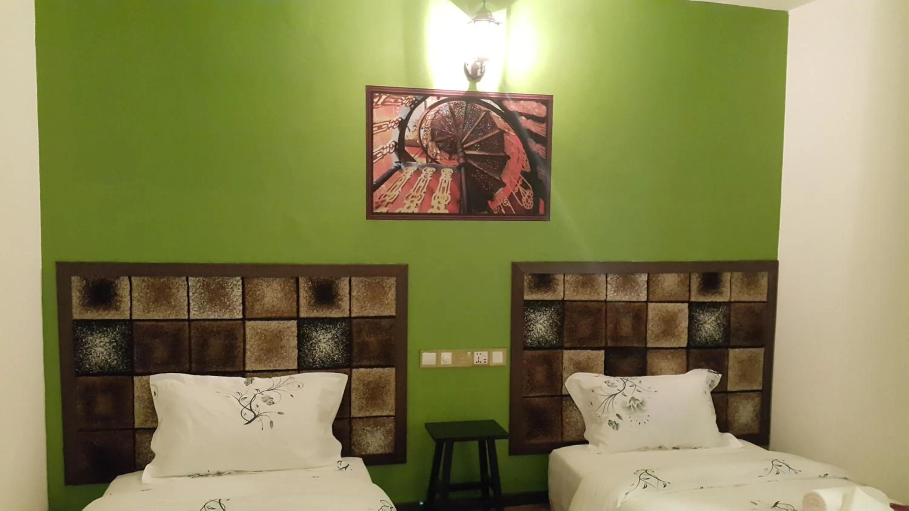 Bedroom in PI Grand Hotel