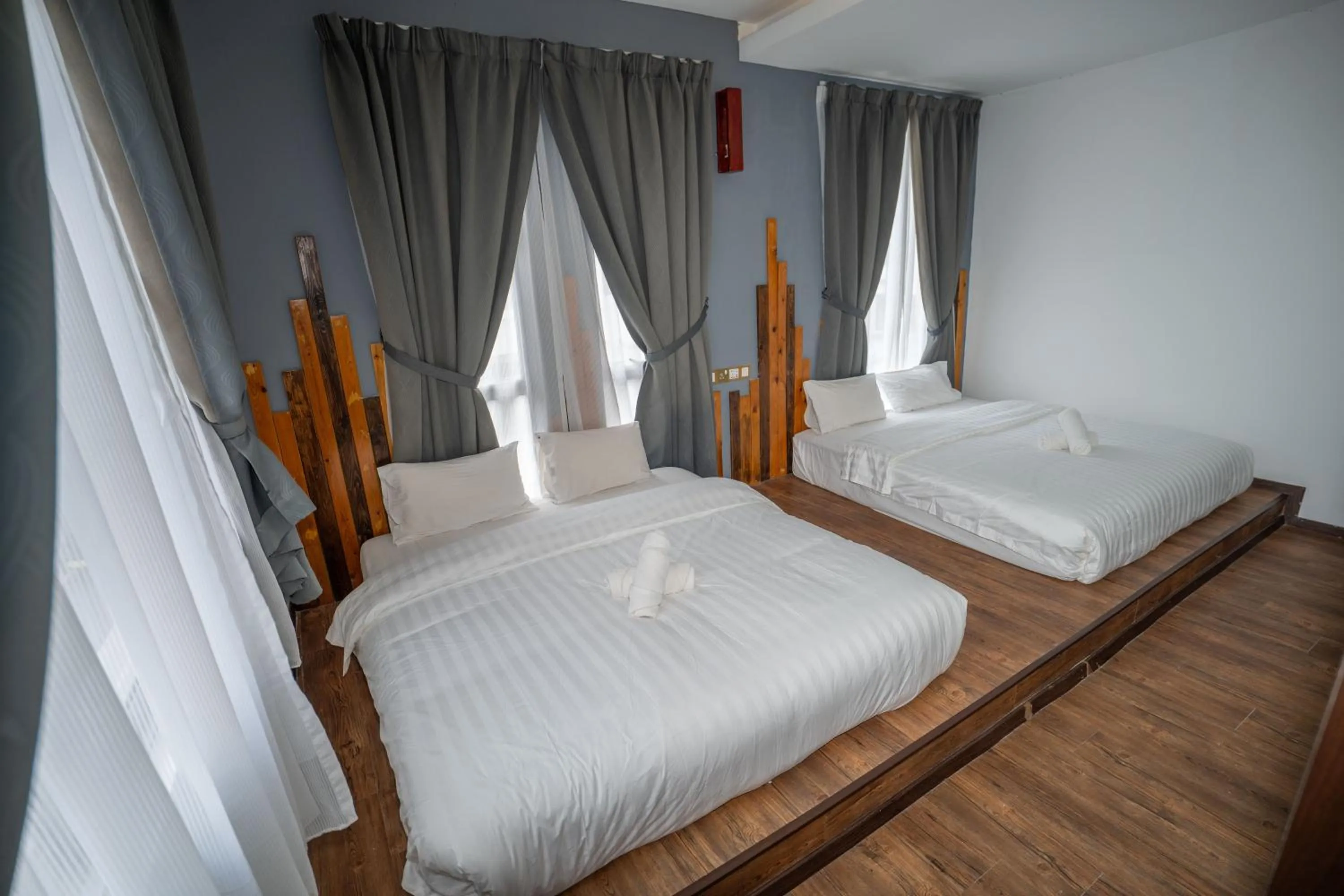 Bed in De Grand Boutique Hotel