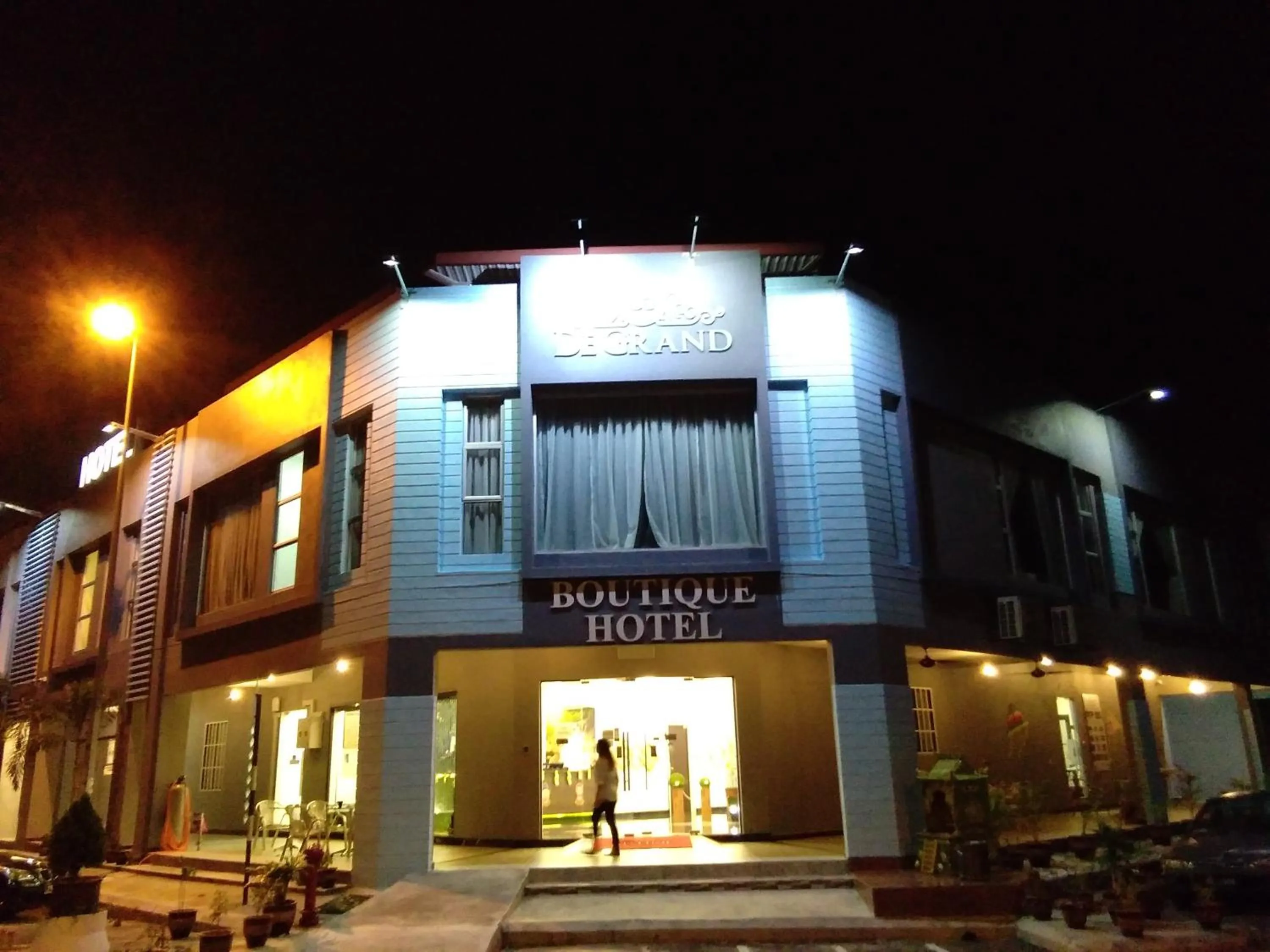 Property logo or sign in PI Grand Hotel