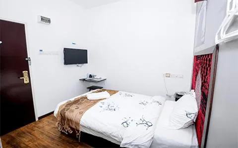 Bedroom in PI Grand Hotel