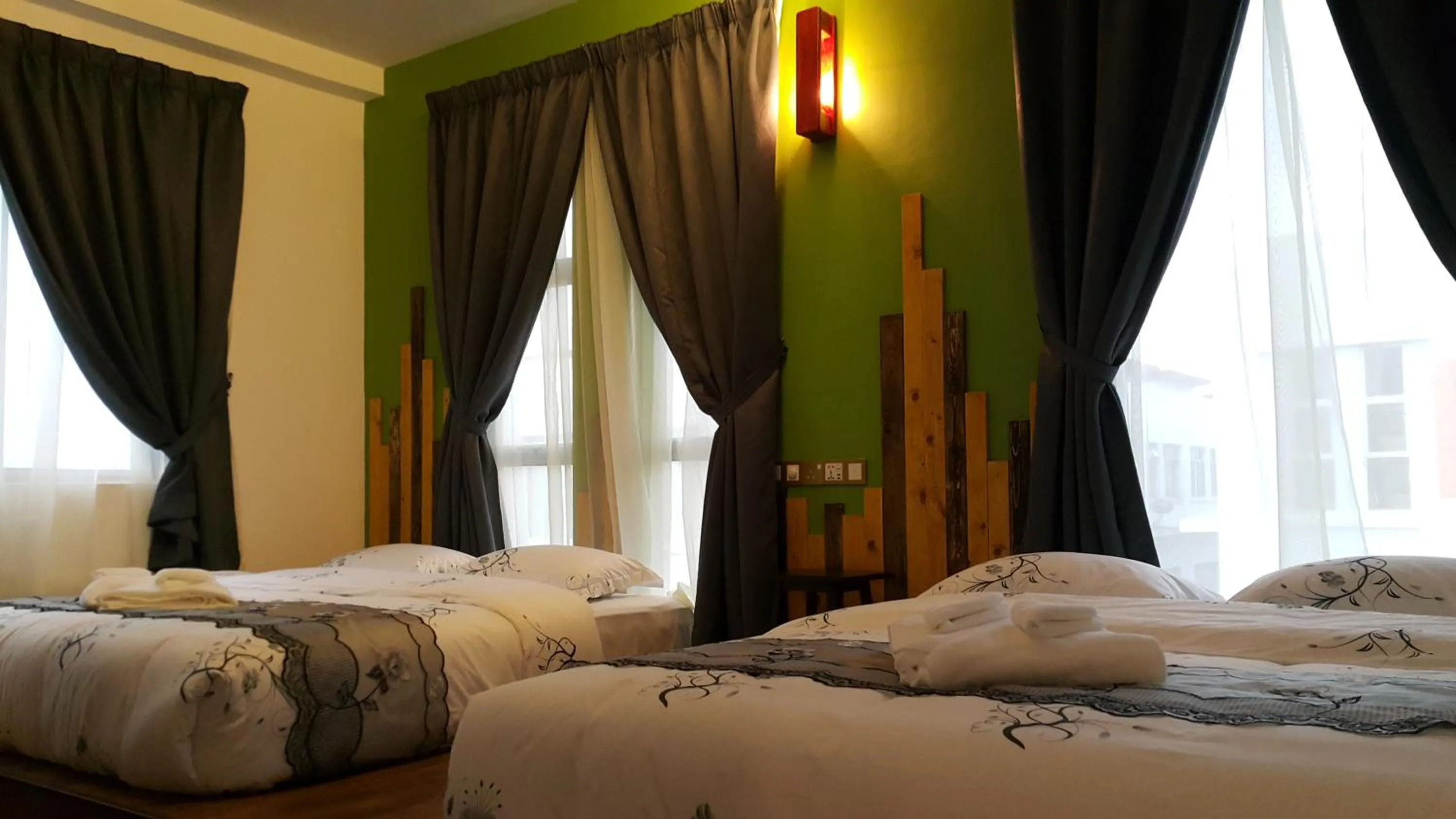 Bedroom in PI Grand Hotel