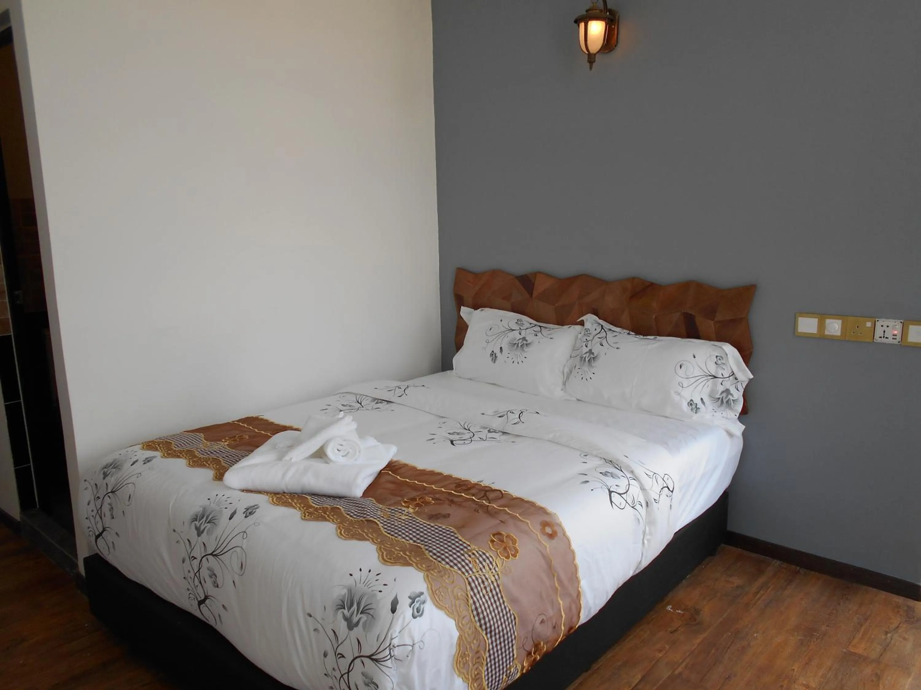 Bedroom in PI Grand Hotel