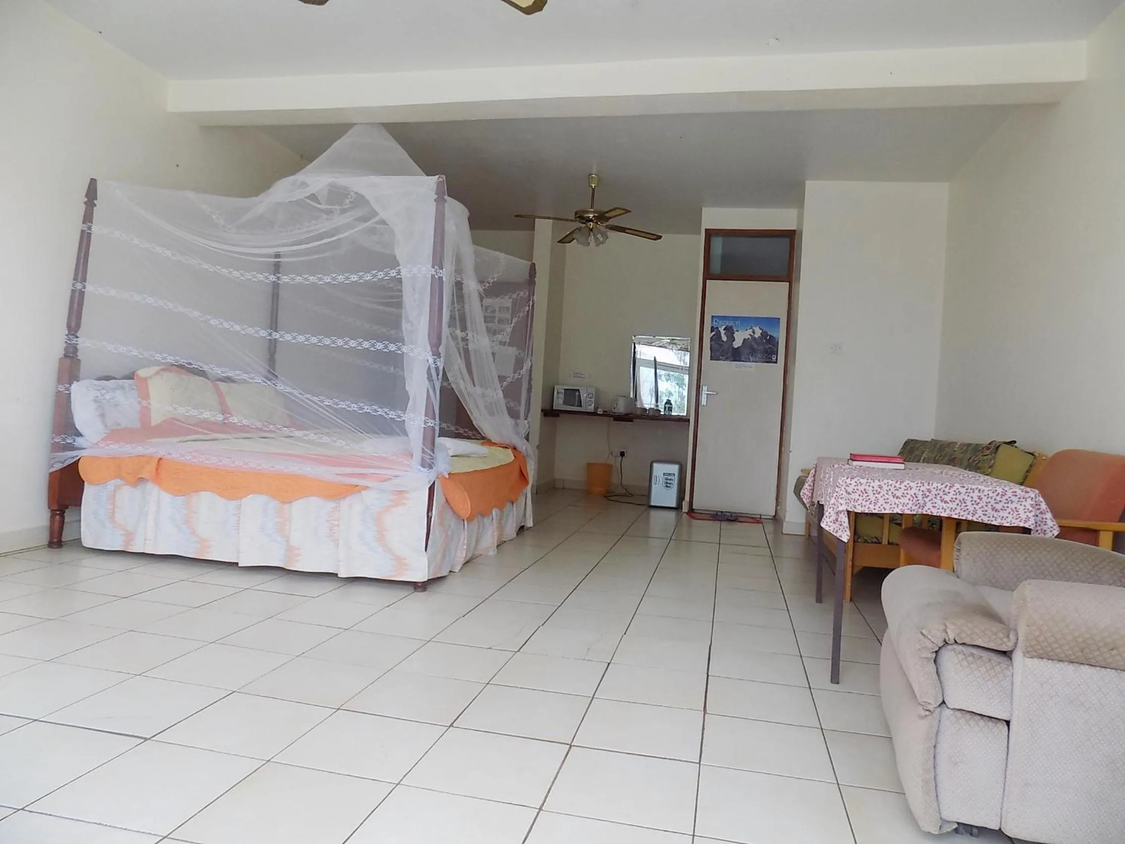 Photo of the whole room in Sunrise Apartments Hotel Fort Portal