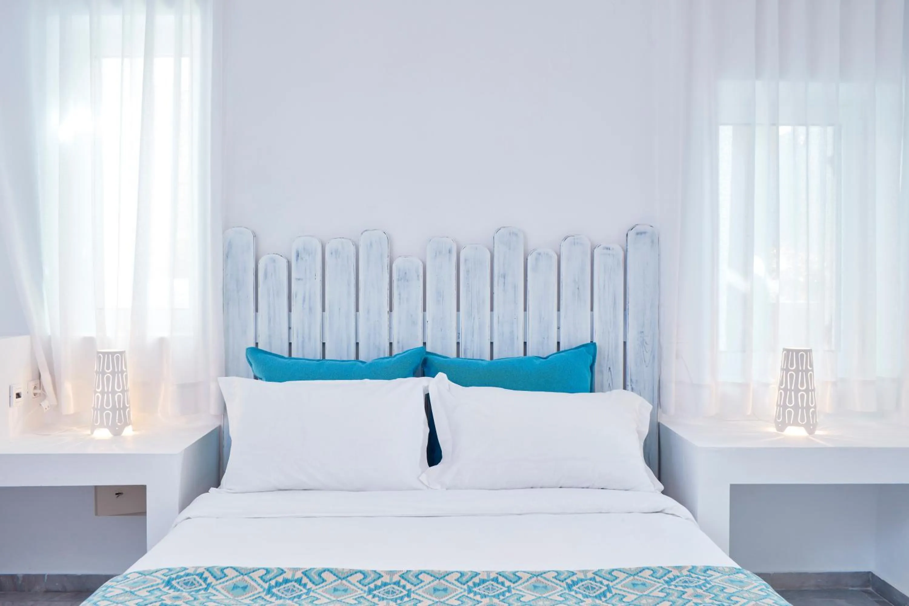 Decorative detail, Bed in Mykonos Town Suites