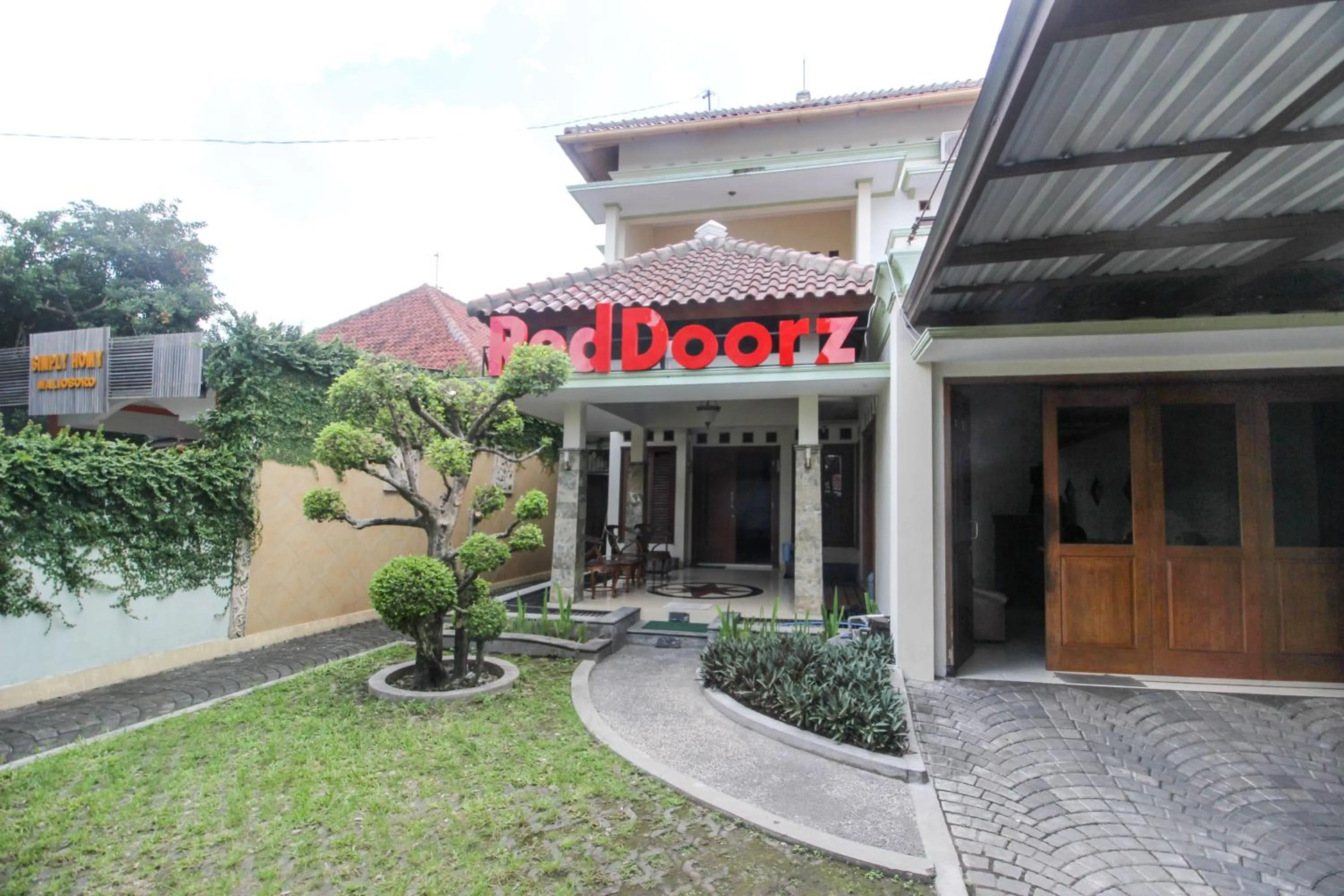 Property logo or sign in RedDoorz plus @ Tegal Panggung