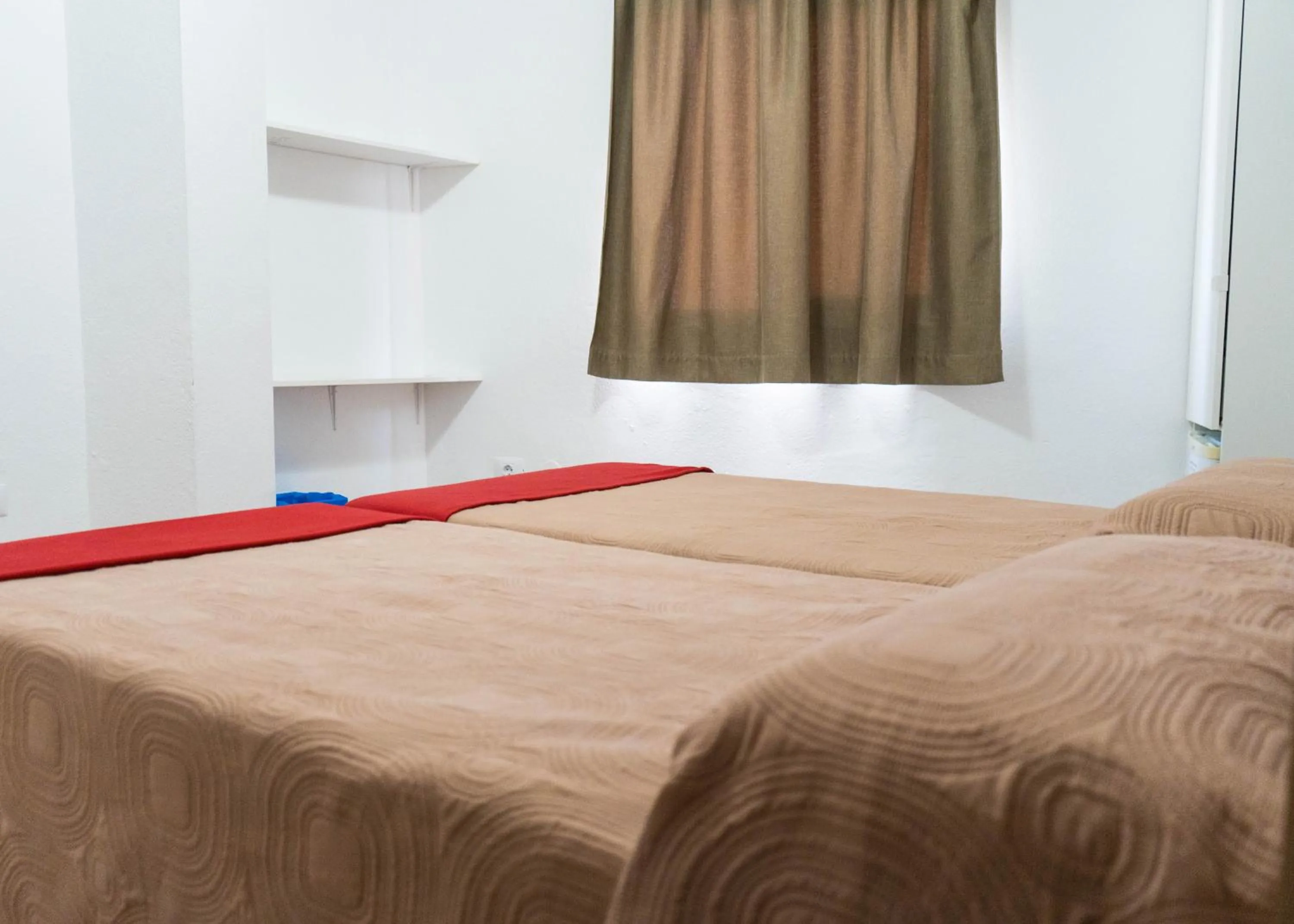 Bed in Pensión Alcalá