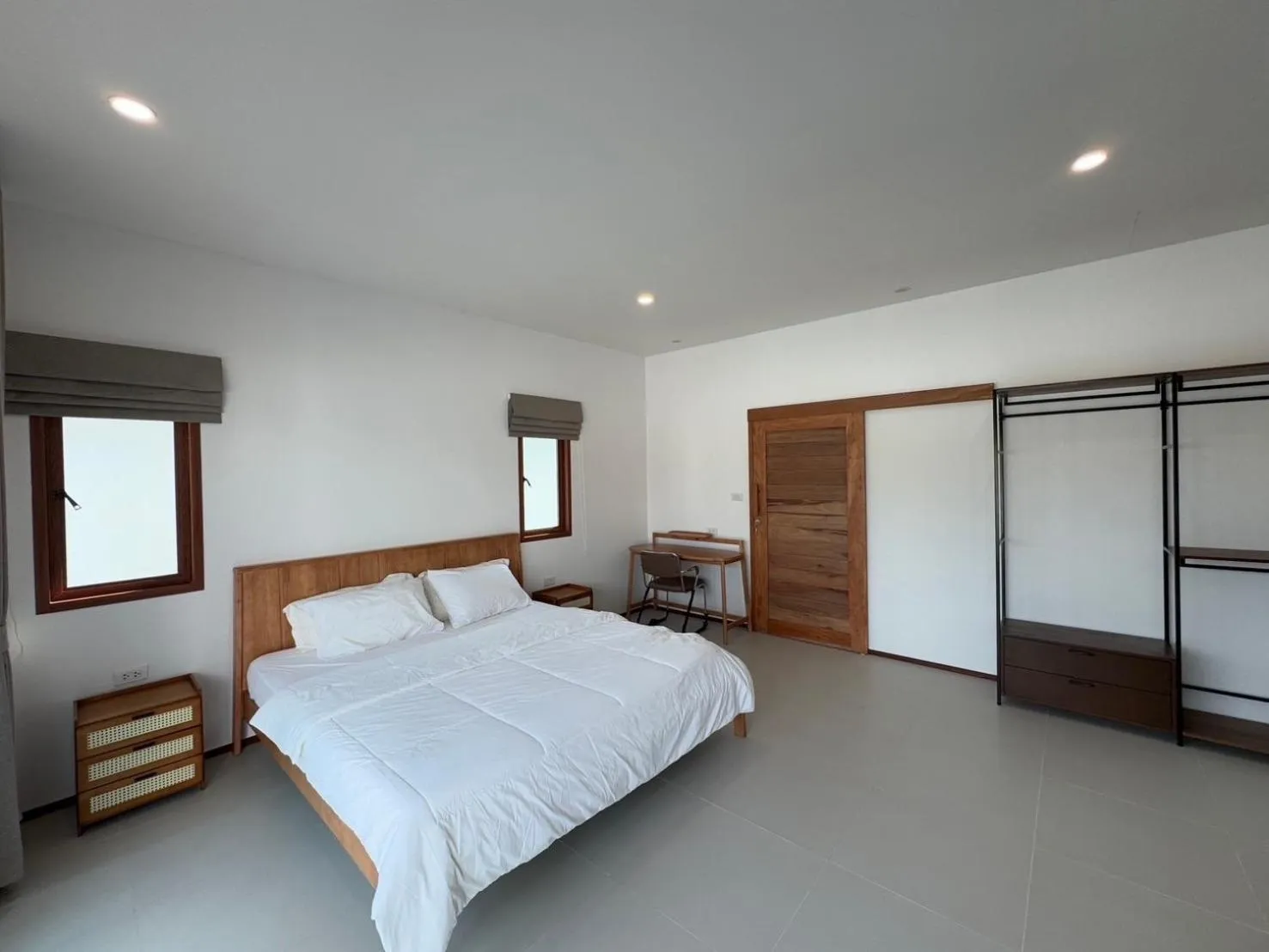 Bed in Maikhao Beach Guest House