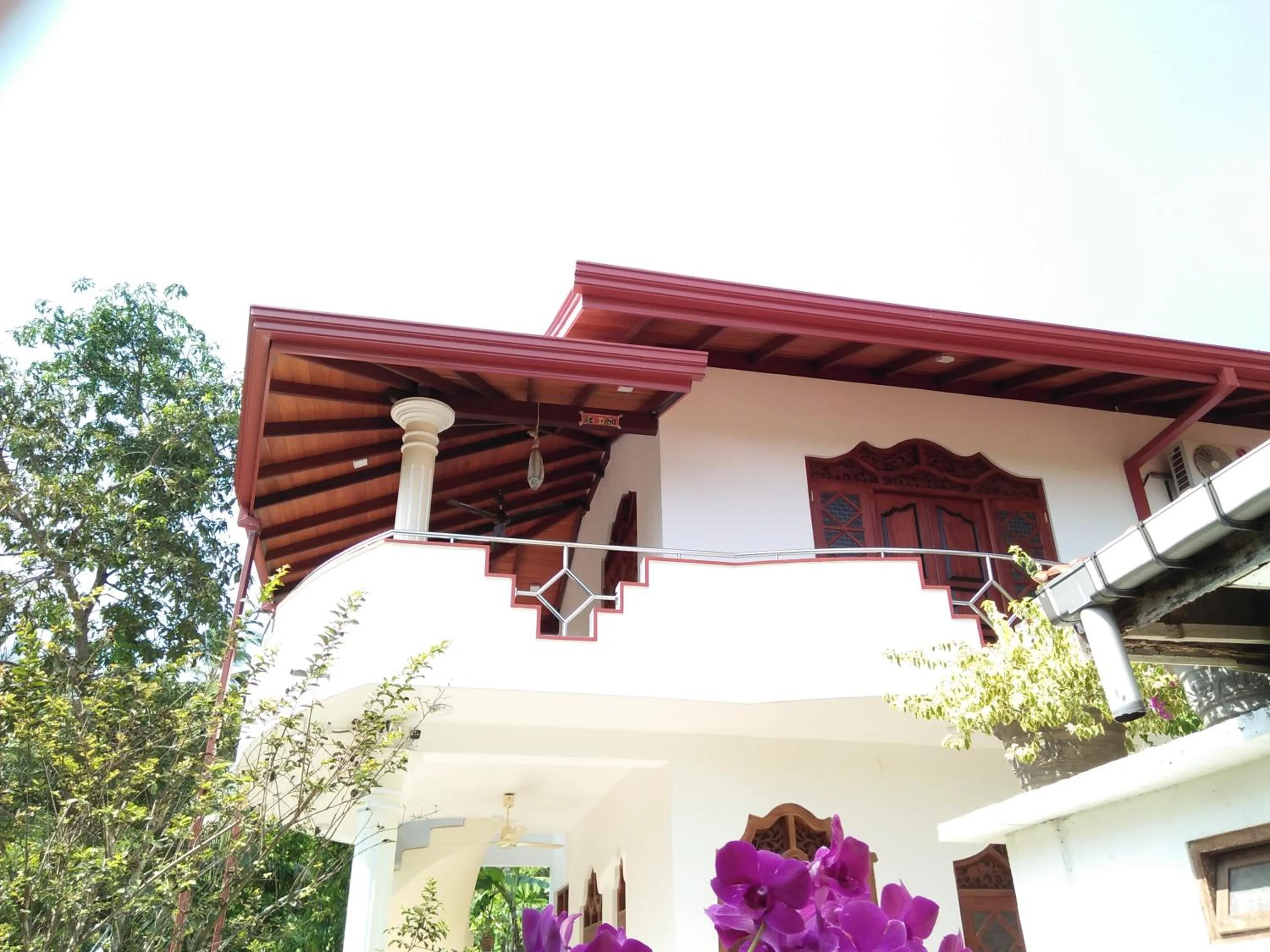 Communal lounge/ TV room in White Elephant Villa & Restaurant