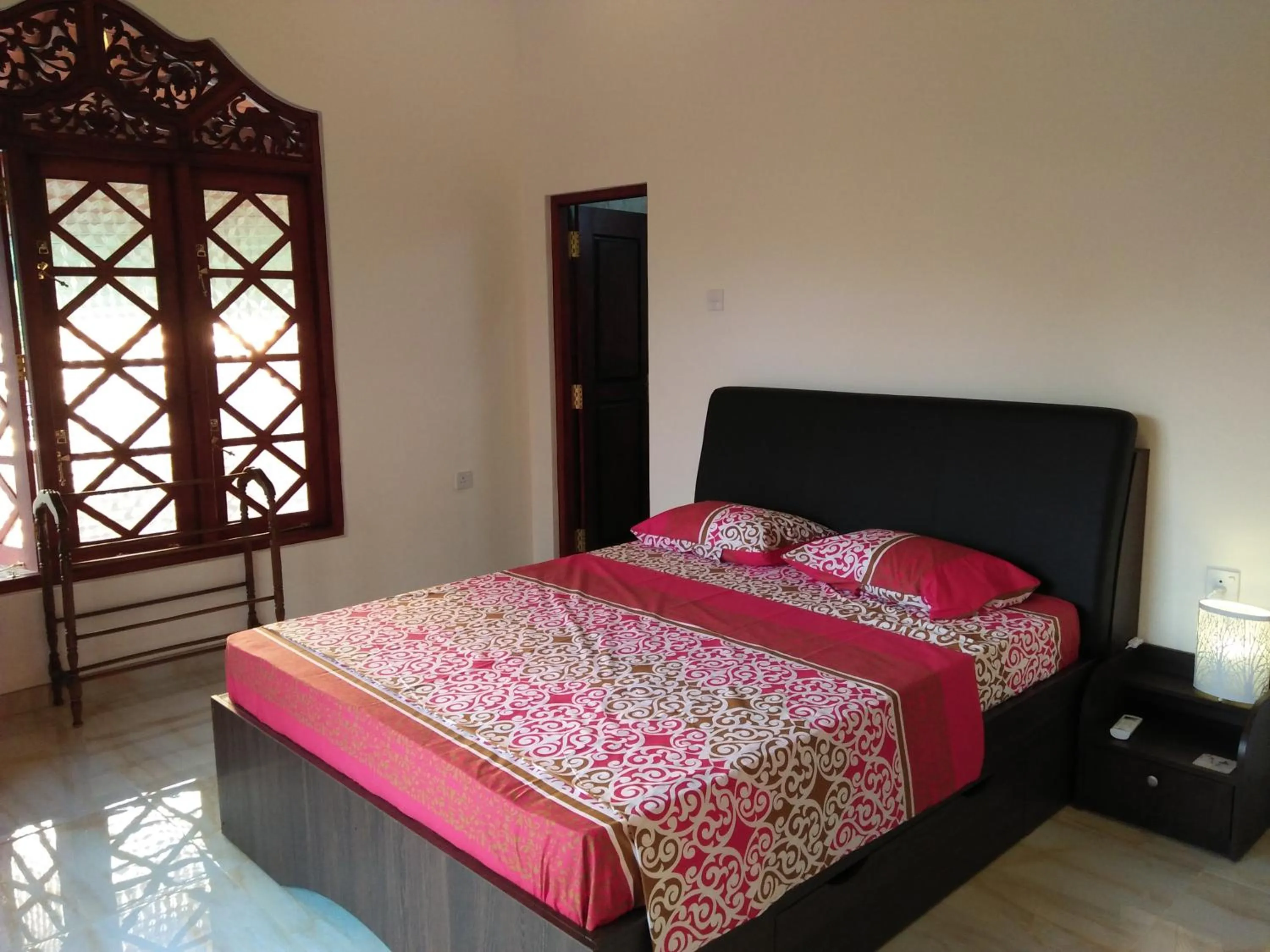 Bed in White Elephant Villa & Restaurant