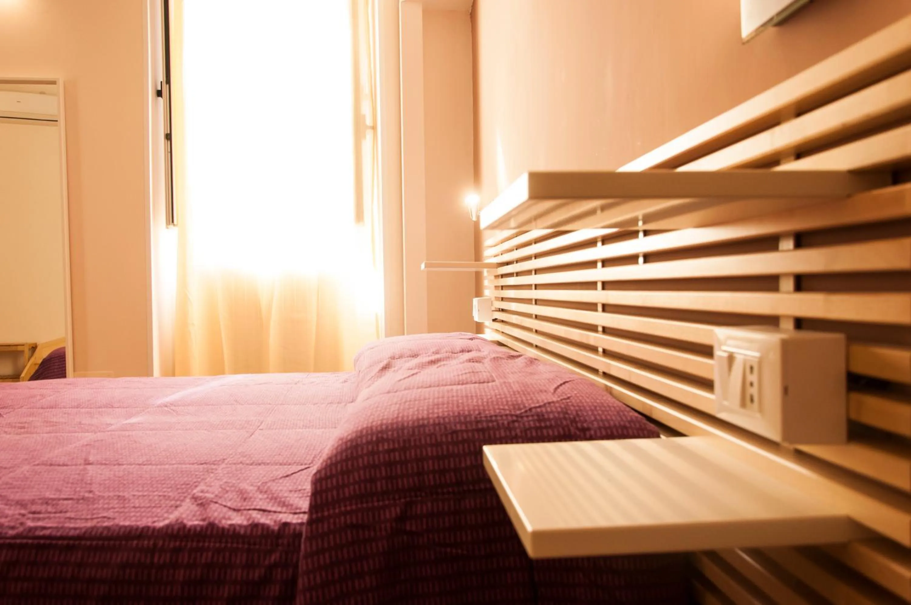 Bed in Palazzo Paladini Rooms Lecce