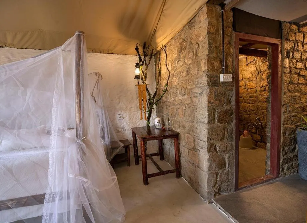 Bed in Deshadan Eco Valley Resort - An Eco friendly Mud House