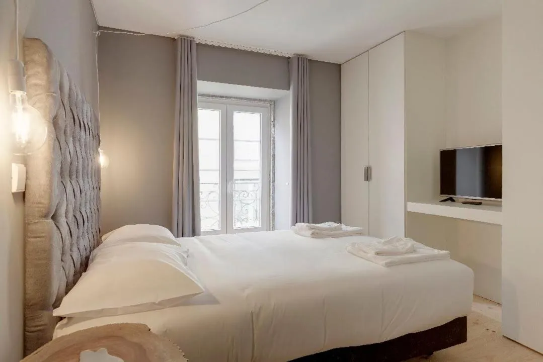 Bed in City Stays Bica Apartments