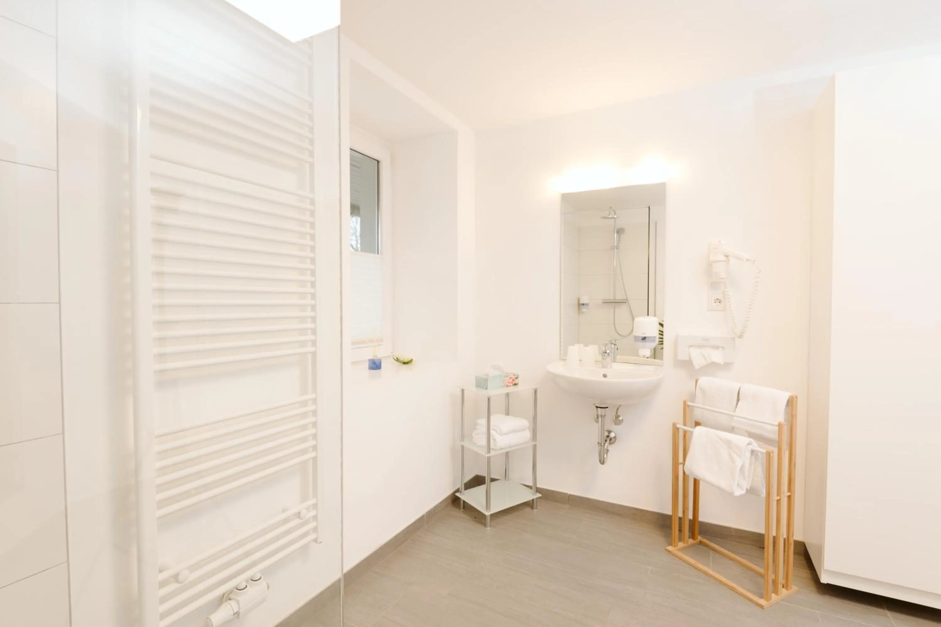 Bathroom, Bed in Velden24 - create your own stay