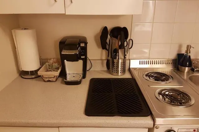 Kitchen or kitchenette in Cozy Little Studio #16 by Amazing Property Rentals