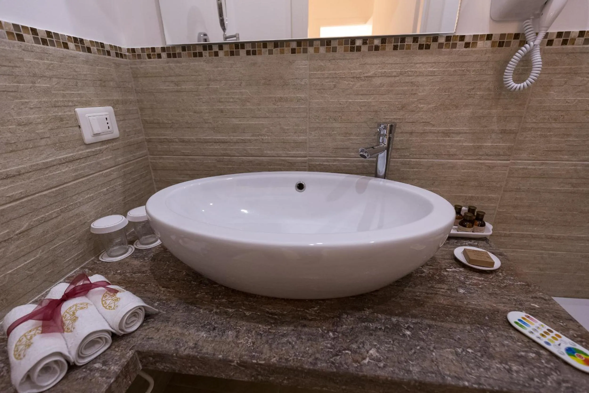 Bathroom in Dimora San Quirico - bed e breakfast - Cisternino