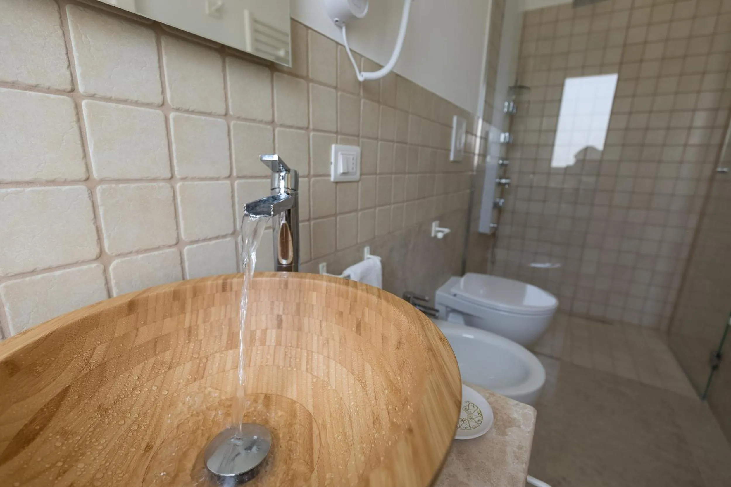 Bathroom in Dimora San Quirico - bed e breakfast - Cisternino