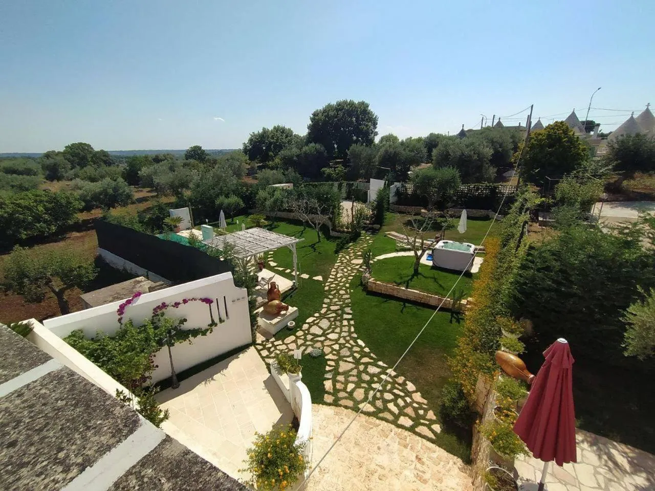 Garden in Dimora San Quirico - bed e breakfast - Cisternino